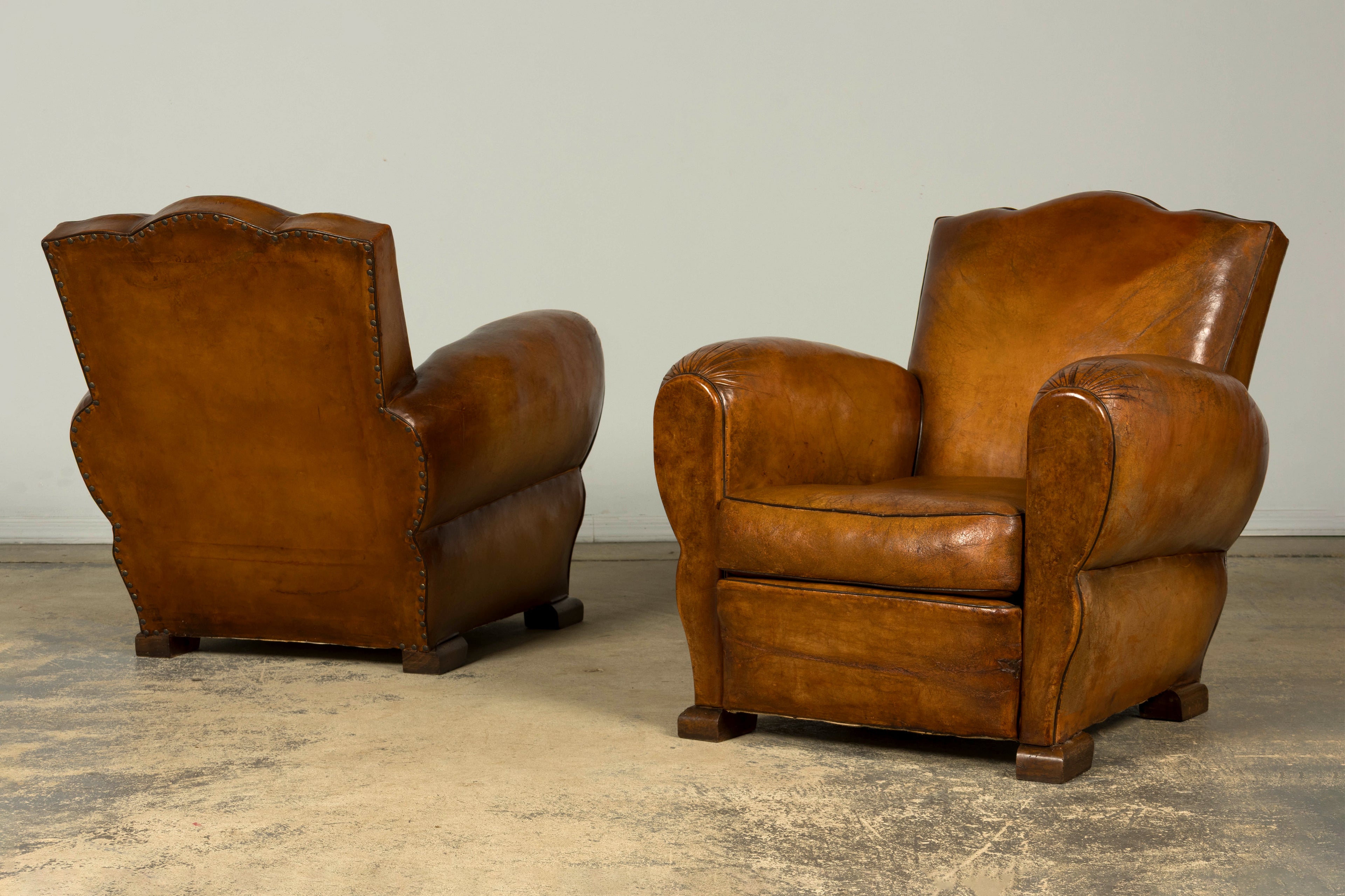 1920s French Art Deco Scalloped Back Cognac Leather Club Chairs – A Pair