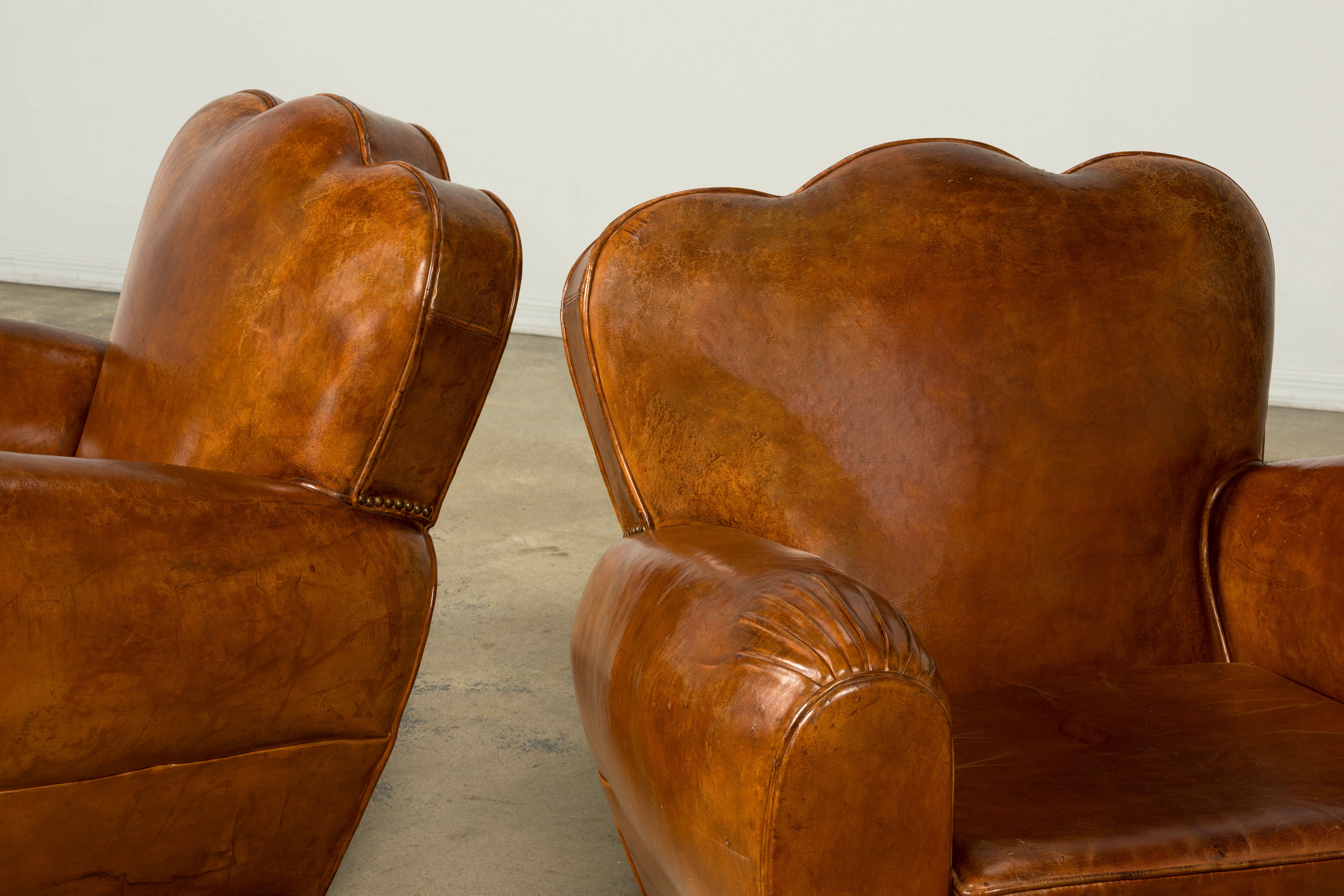 1930s French Art Deco Scalloped Back Cognac Leather Club Chairs, Pair
