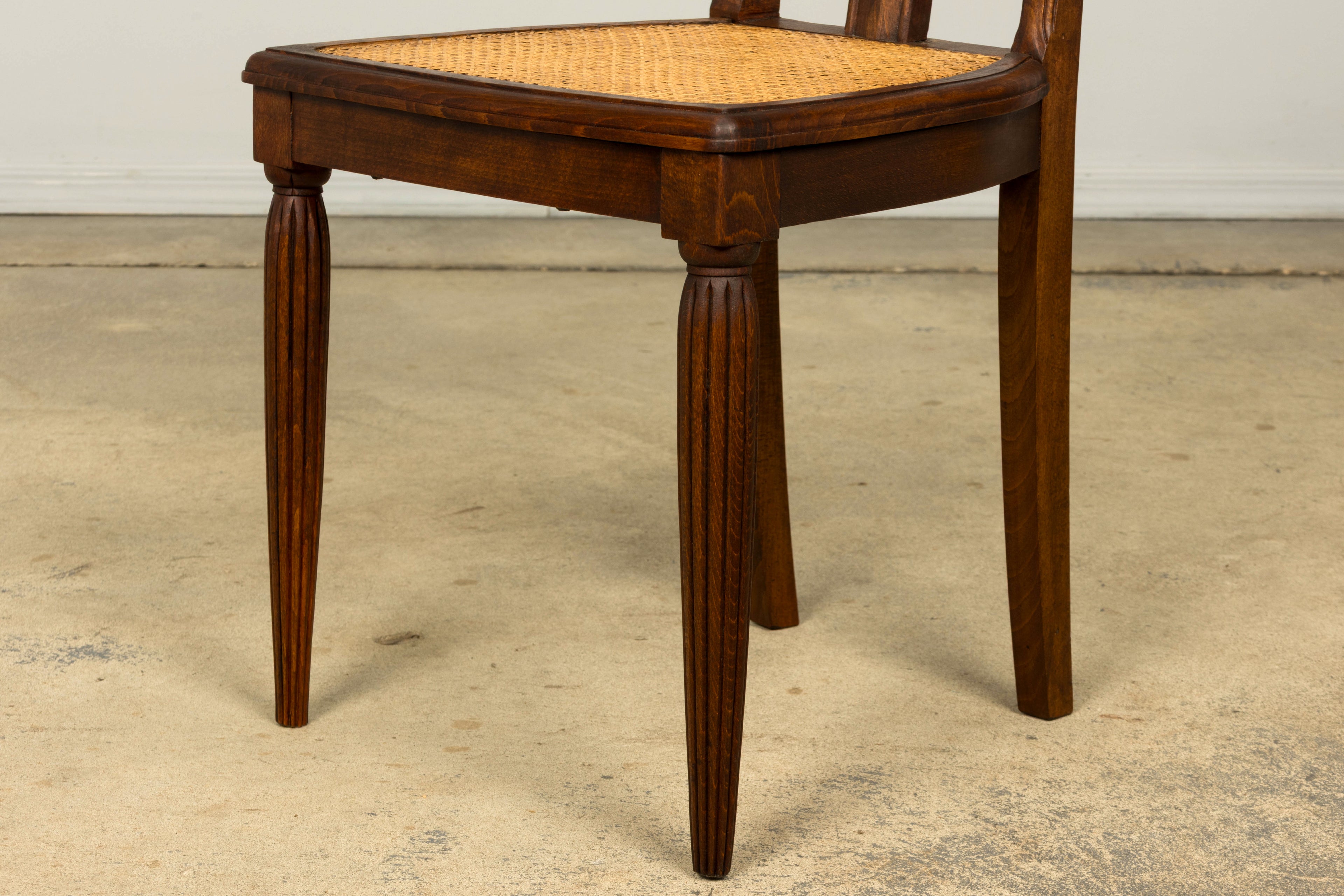 1930s Set of Six French Art Deco Carved Maple & Cane Dining Chairs