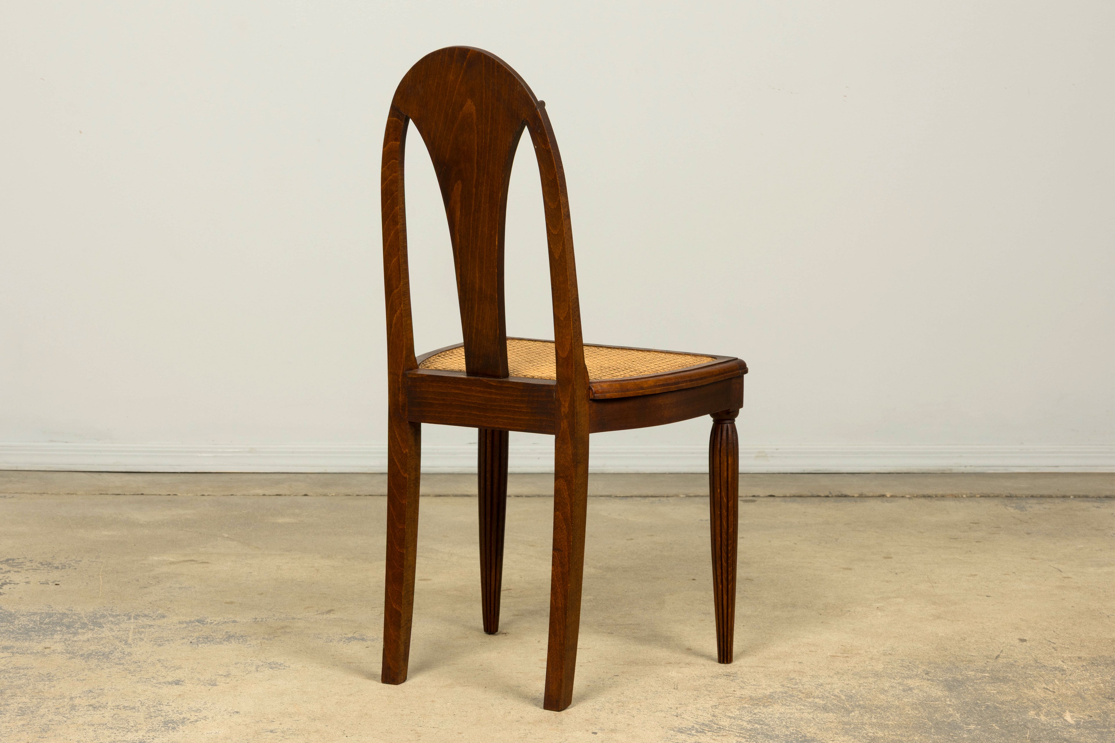 1930s Set of Six French Art Deco Carved Maple & Cane Dining Chairs