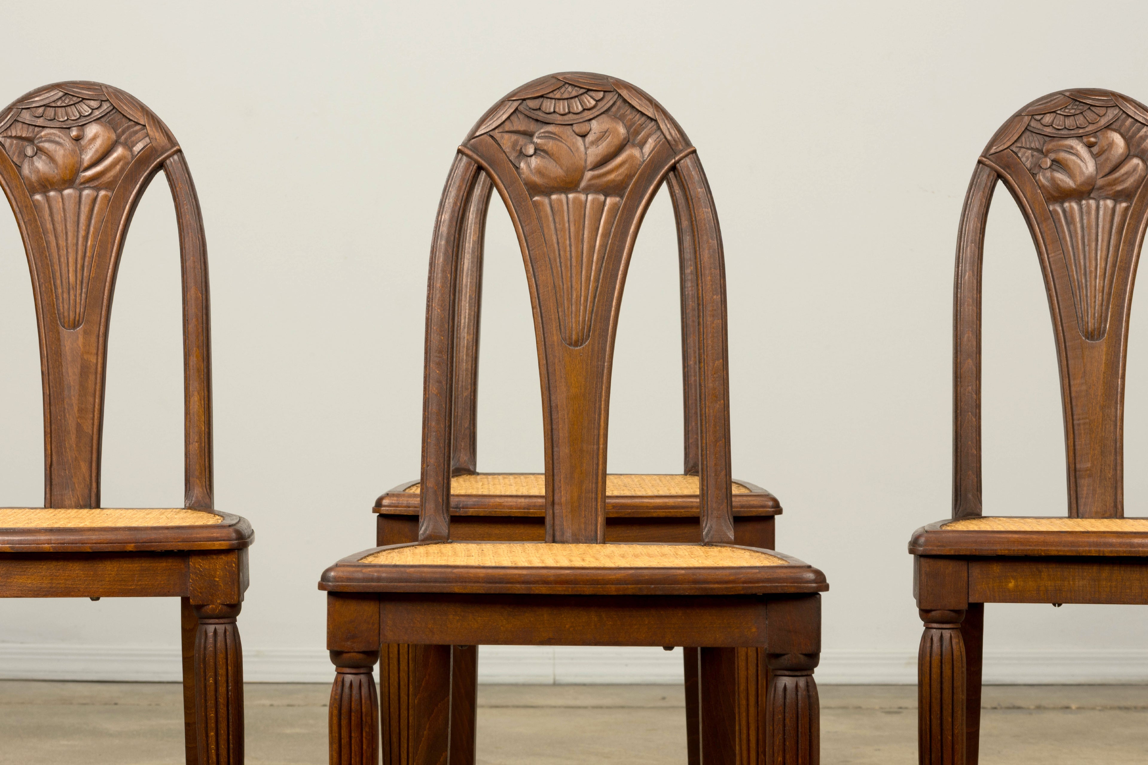 1930s Set of Six French Art Deco Carved Maple & Cane Dining Chairs