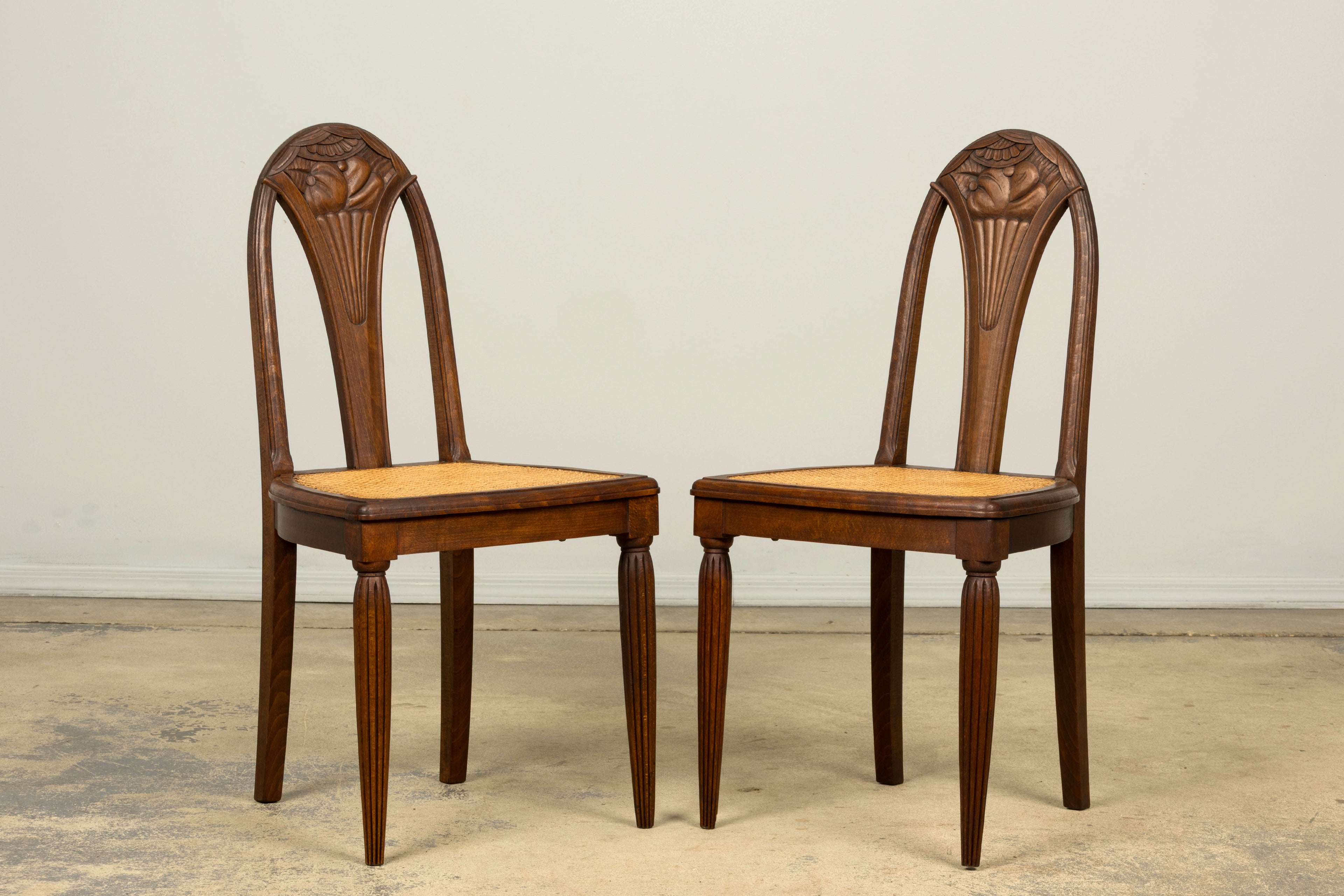 1930s Set of Six French Art Deco Carved Maple & Cane Dining Chairs