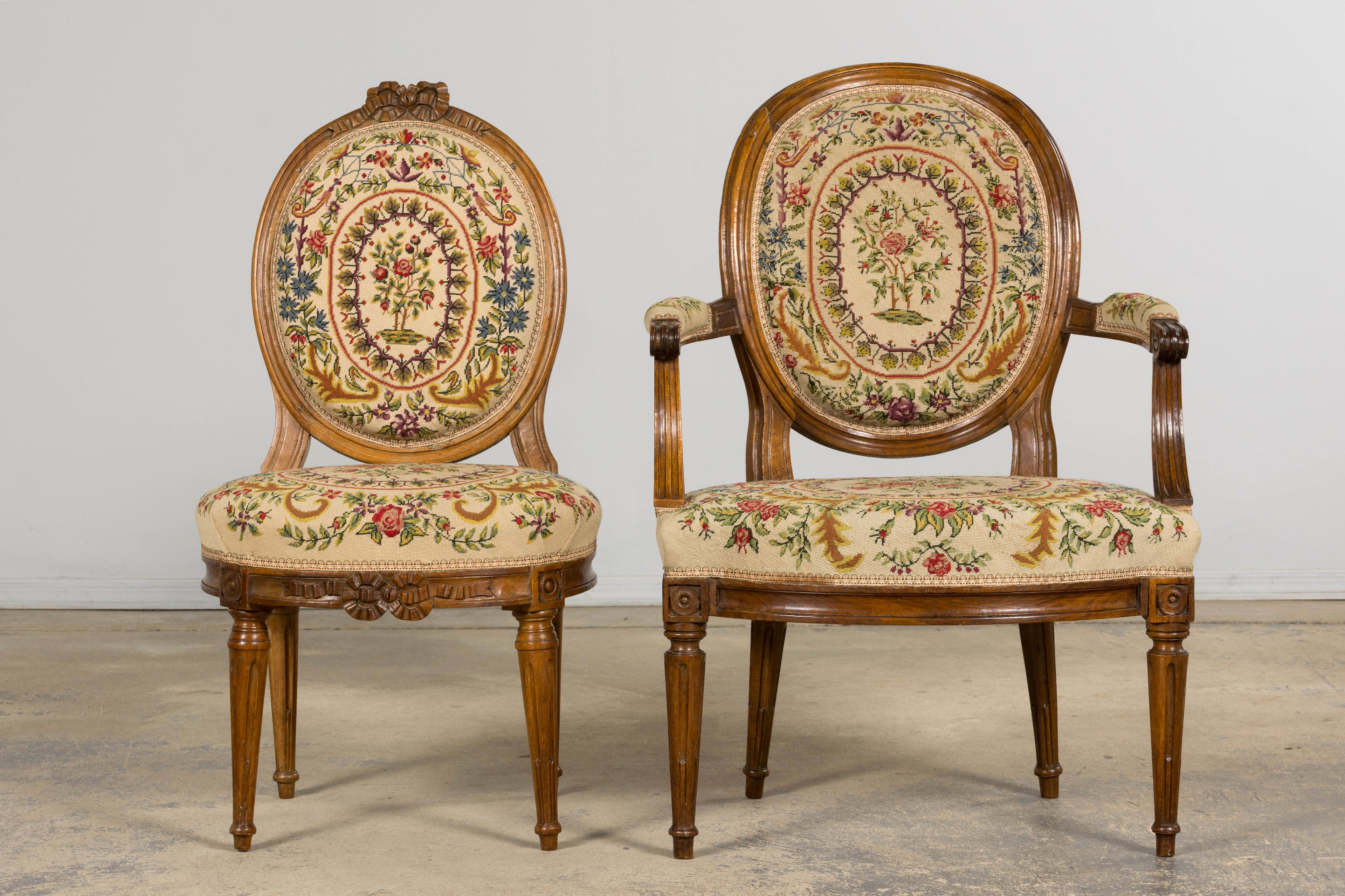 Set of Six Late 19th Century French Louis XVI Style Walnut Chairs with Pair of Fauteuils