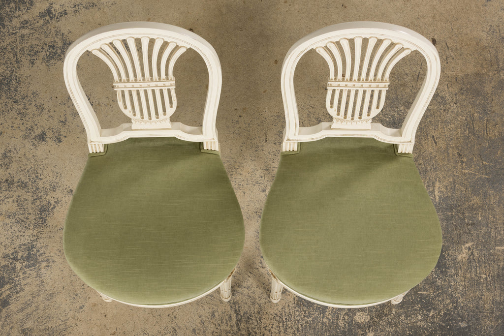 Pair of French Louis XVI Neoclassical Style Painted Lyre Back Accent Chairs in Laurel Green Velvet