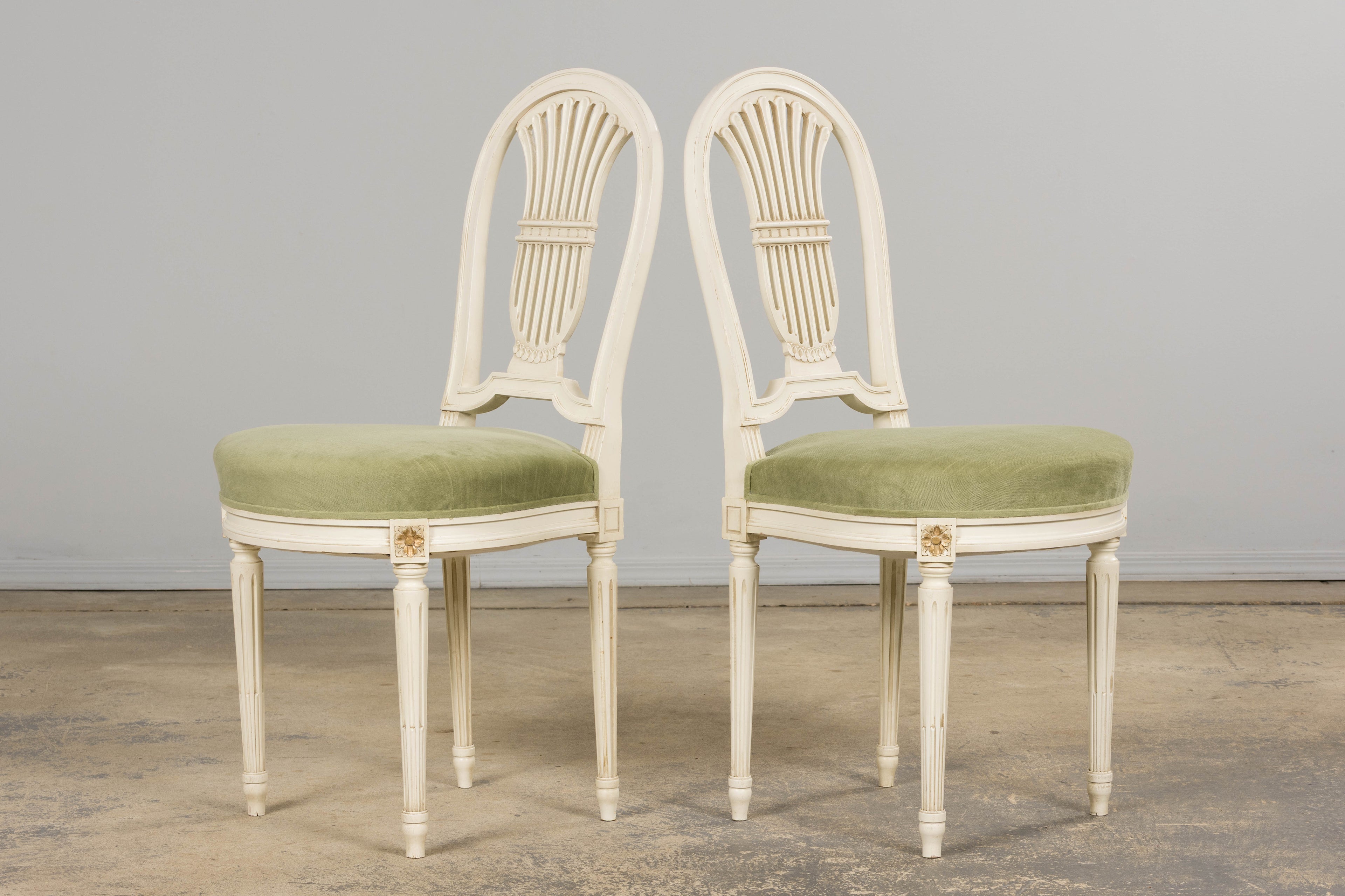 Pair of French Louis XVI Neoclassical Style Painted Lyre Back Accent Chairs in Laurel Green Velvet