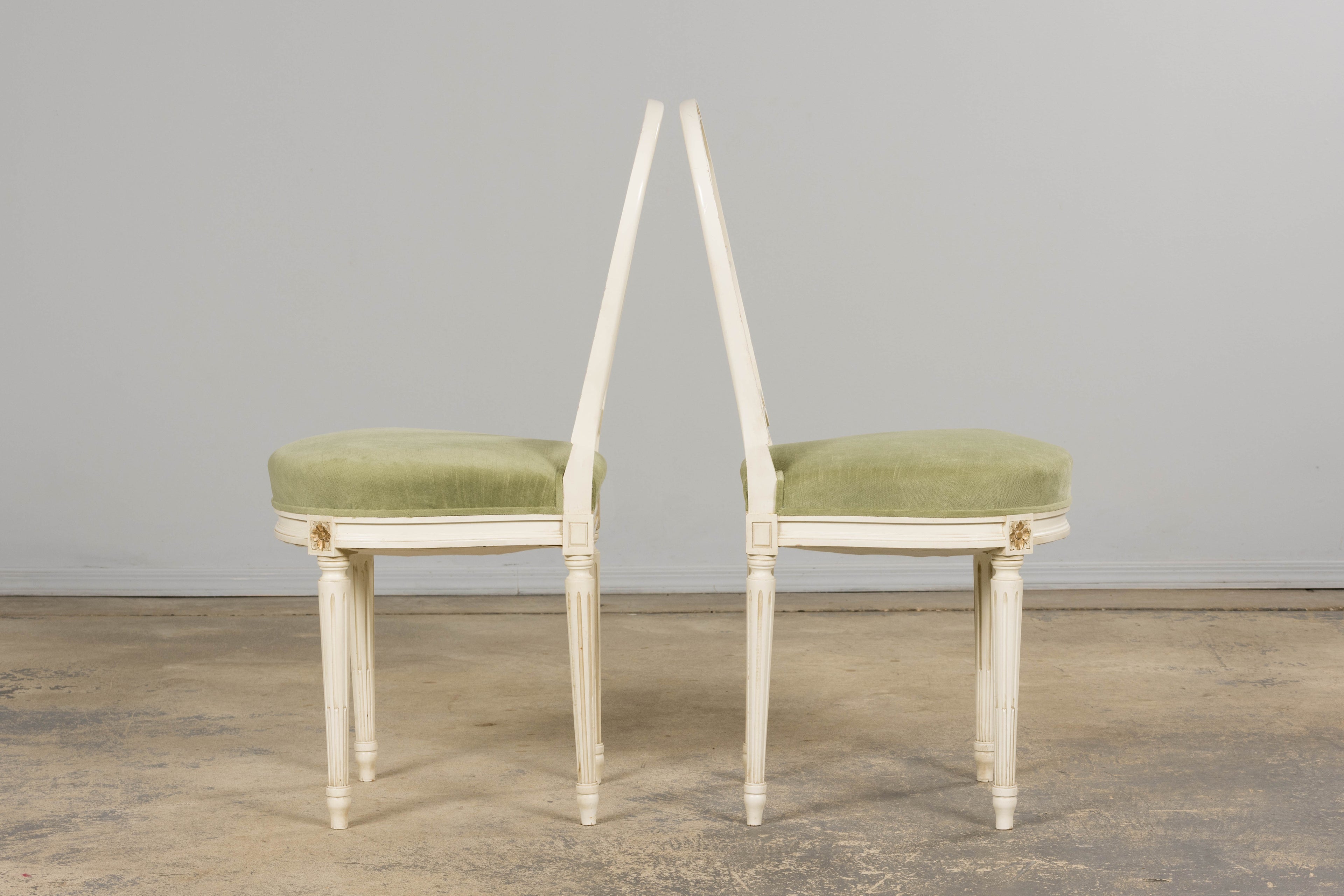 Pair of French Louis XVI Neoclassical Style Painted Lyre Back Accent Chairs in Laurel Green Velvet