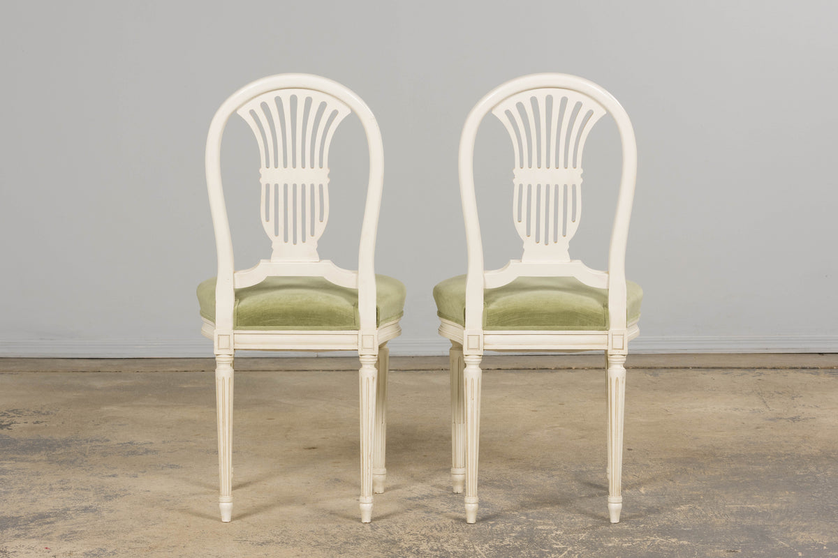 Pair of French Louis XVI Neoclassical Style Painted Lyre Back Accent Chairs in Laurel Green Velvet