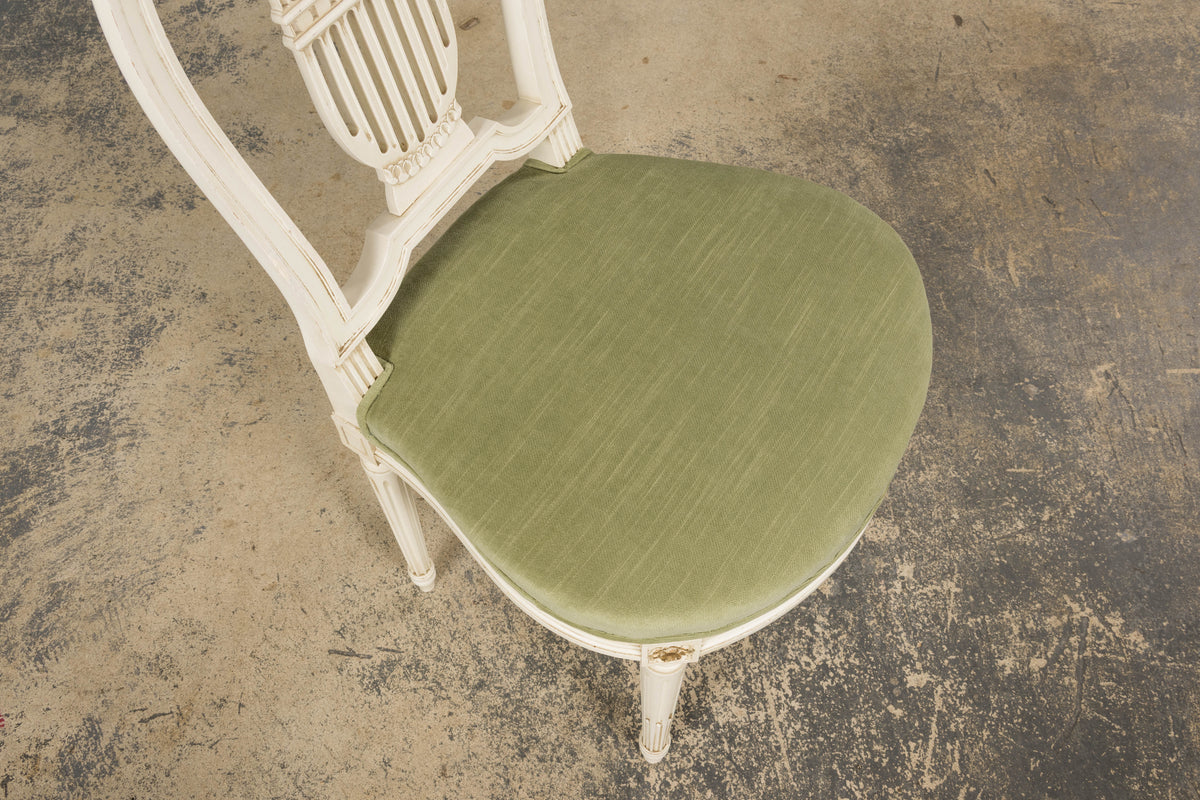 Pair of French Louis XVI Neoclassical Style Painted Lyre Back Accent Chairs in Laurel Green Velvet
