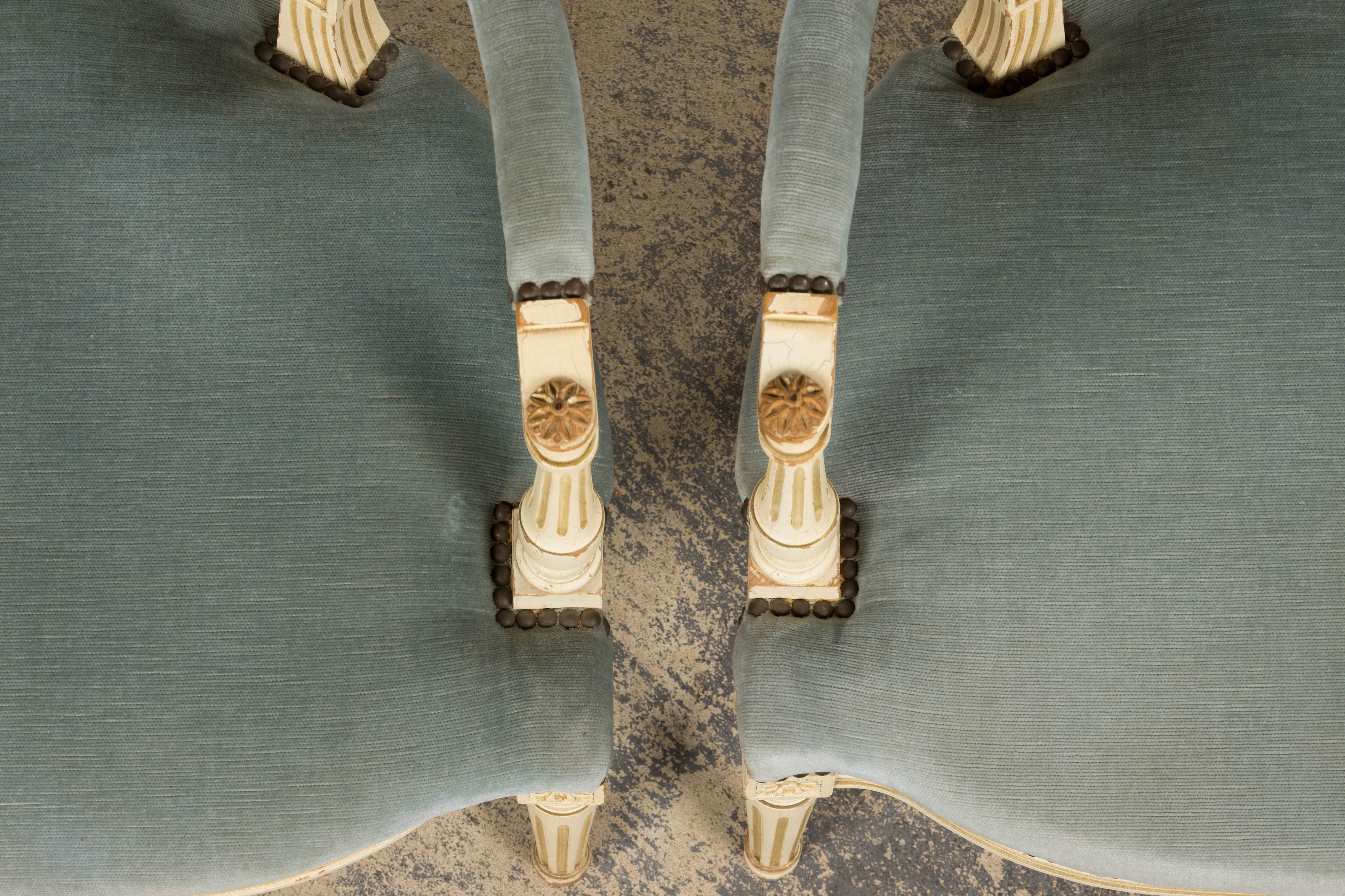 A Pair of Antique French Louis XVI Style Painted Armchairs In Blue Velvet