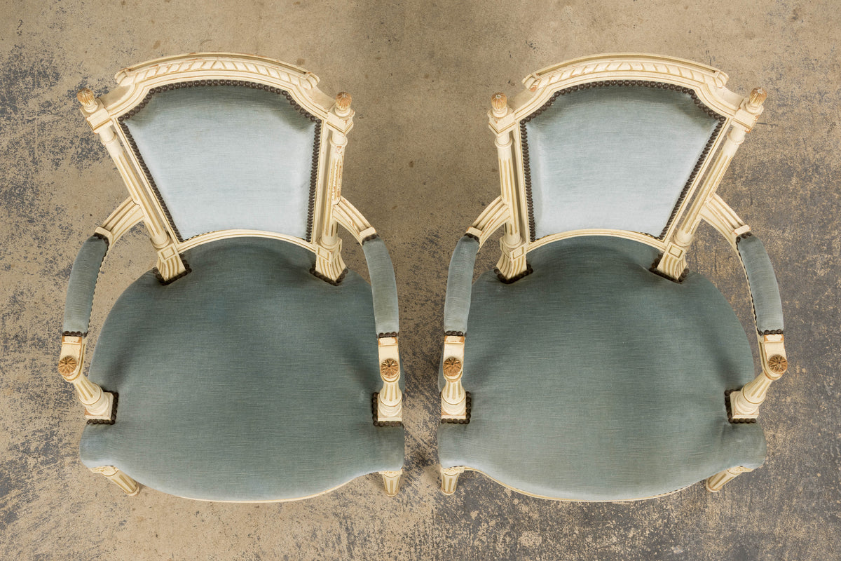 A Pair of Antique French Louis XVI Style Painted Armchairs In Blue Velvet