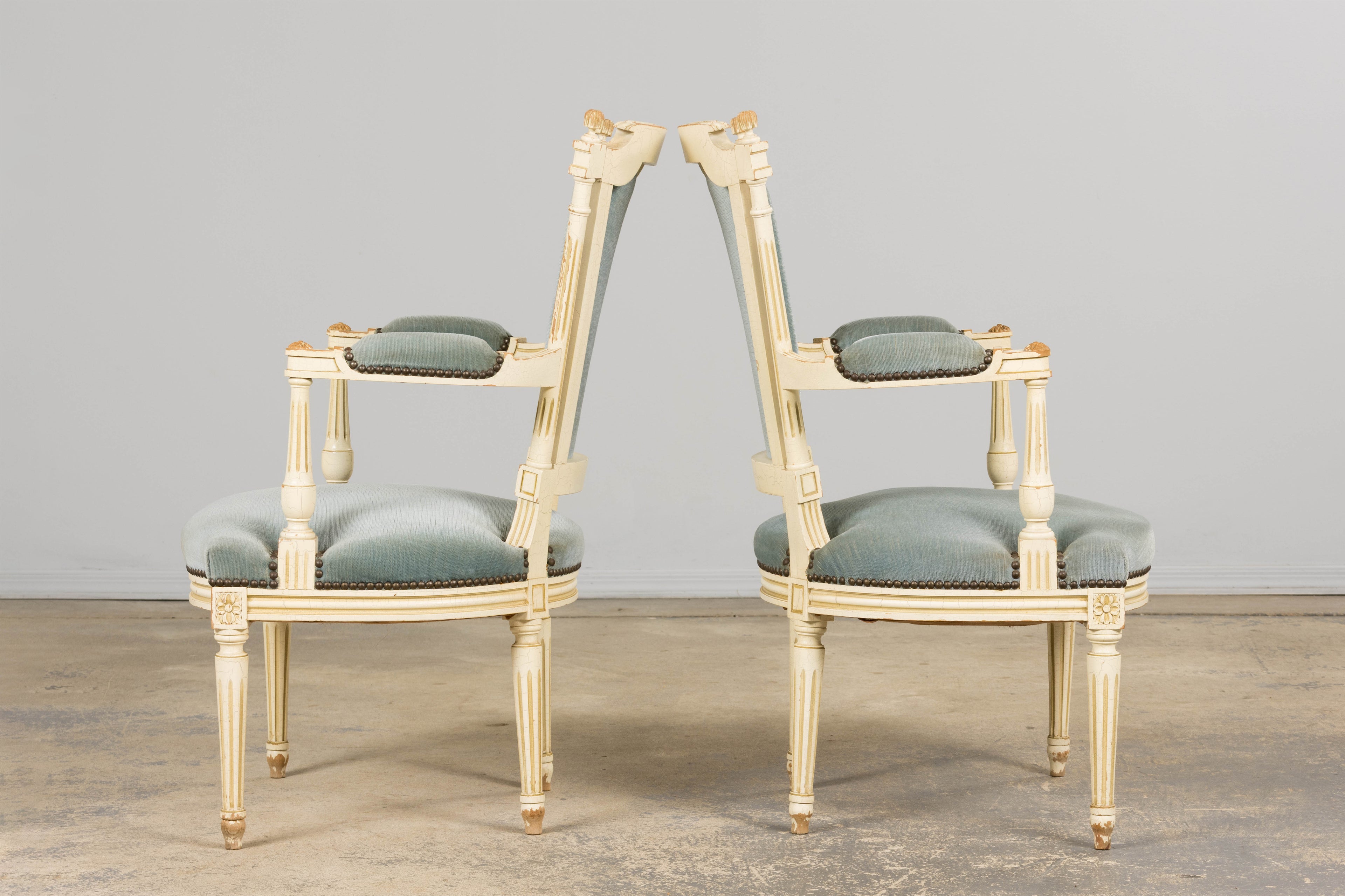 A Pair of Antique French Louis XVI Style Painted Armchairs In Blue Velvet