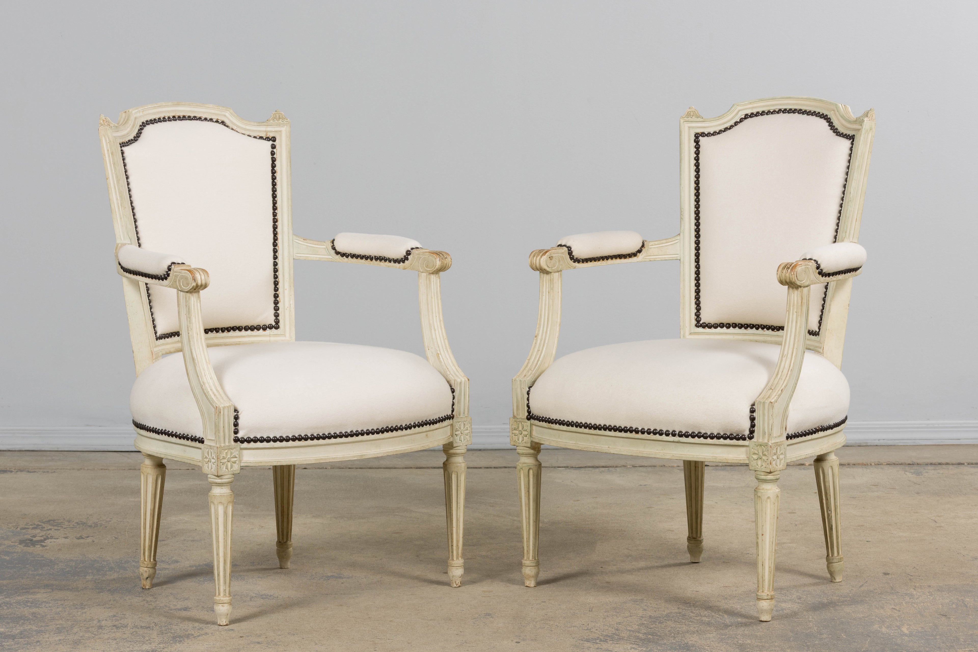Antique French Louis XVI Painted Armchairs in Off-White Wool - A Pair
