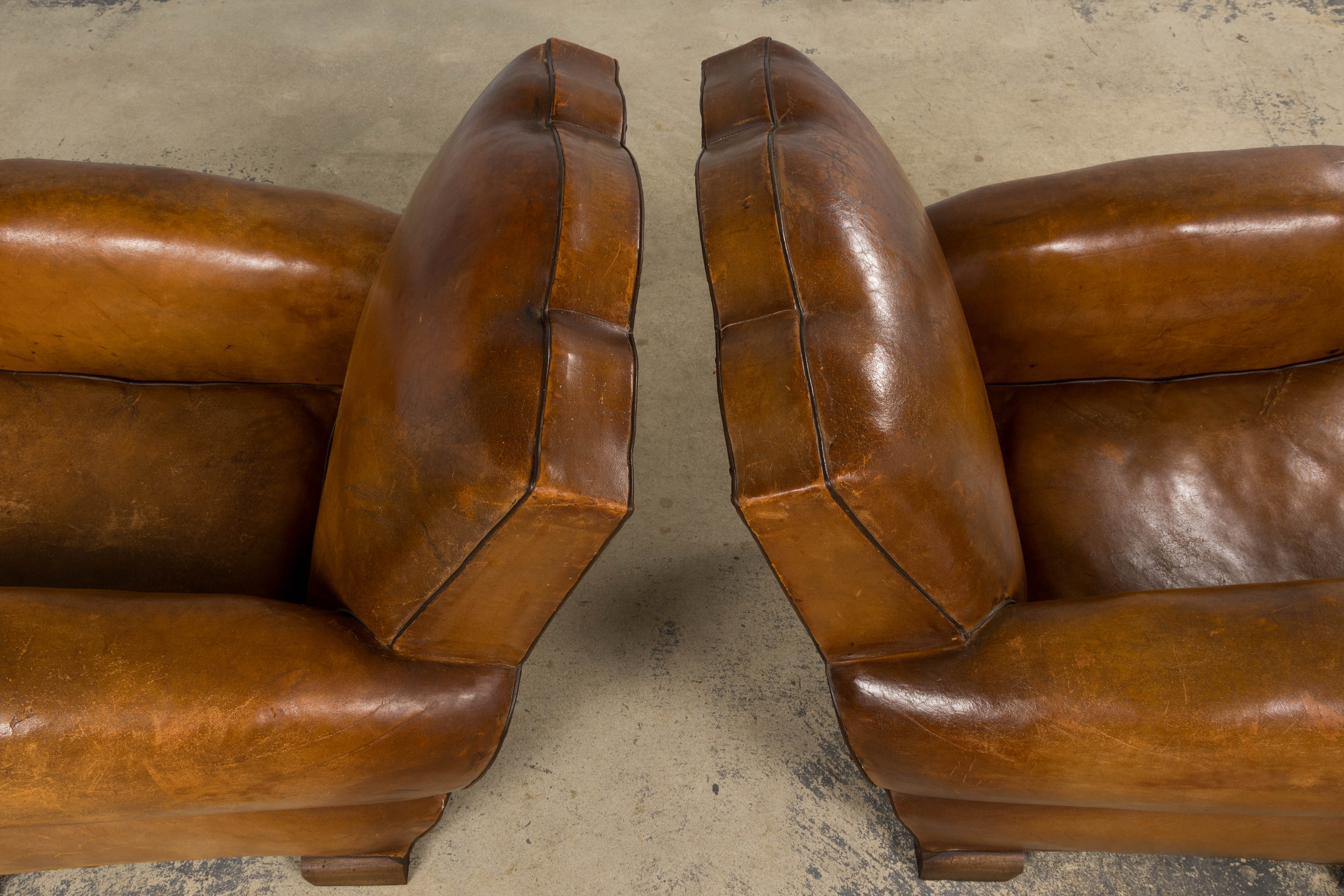 1920s French Art Deco Scalloped Back Club Chairs in Caramel Leather – A Pair