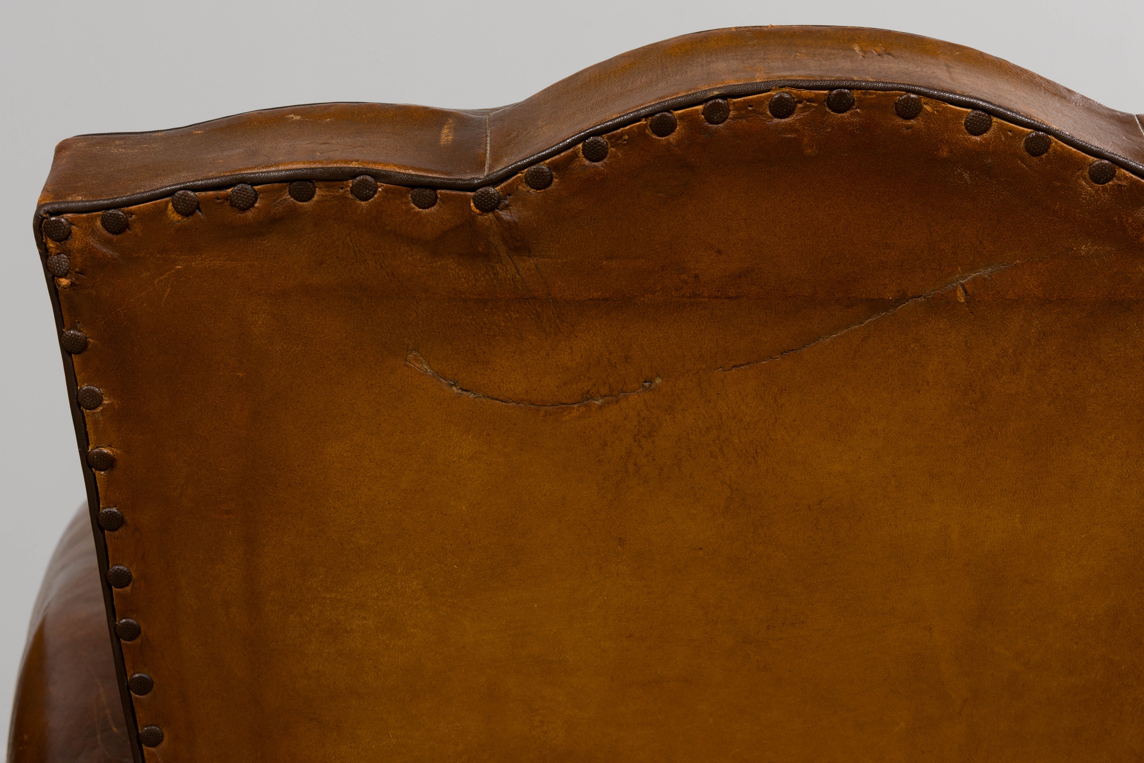 1920s French Art Deco Scalloped Back Club Chairs in Caramel Leather – A Pair