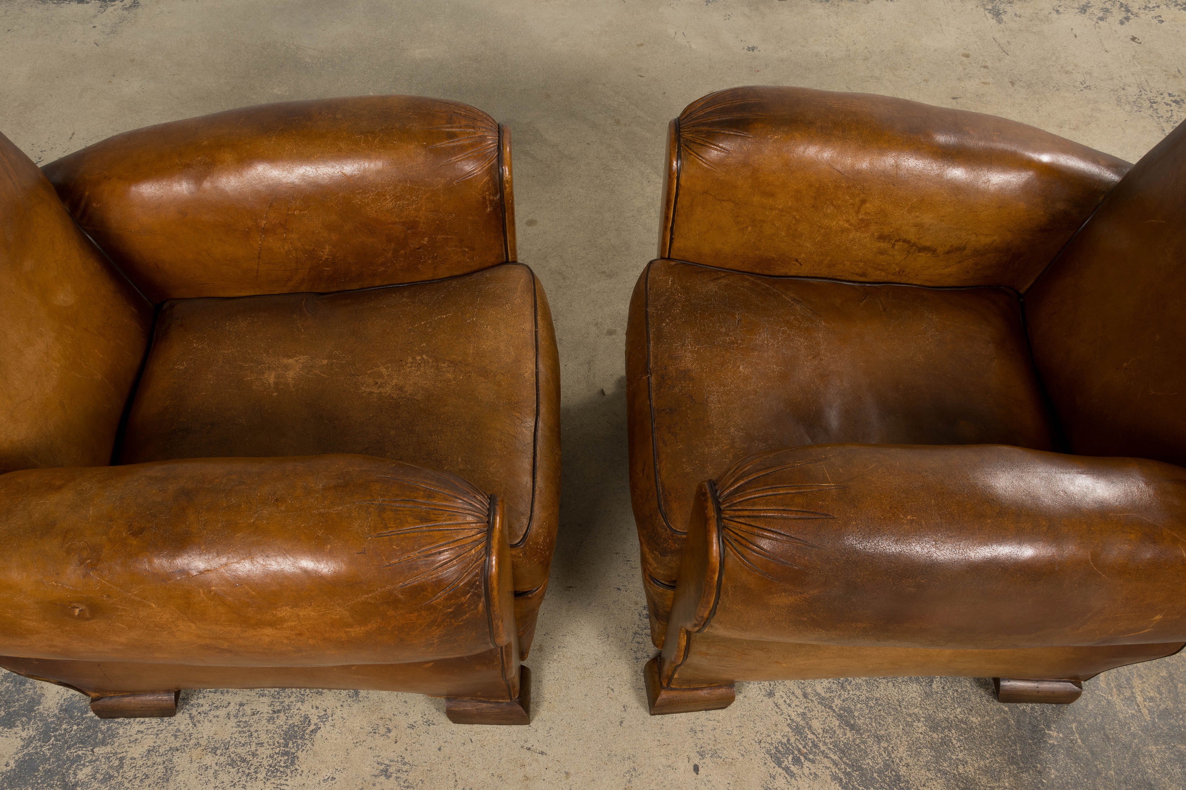 ON HOLD 1920s French Art Deco Scalloped Back Club Chairs in Caramel Leather – A Pair