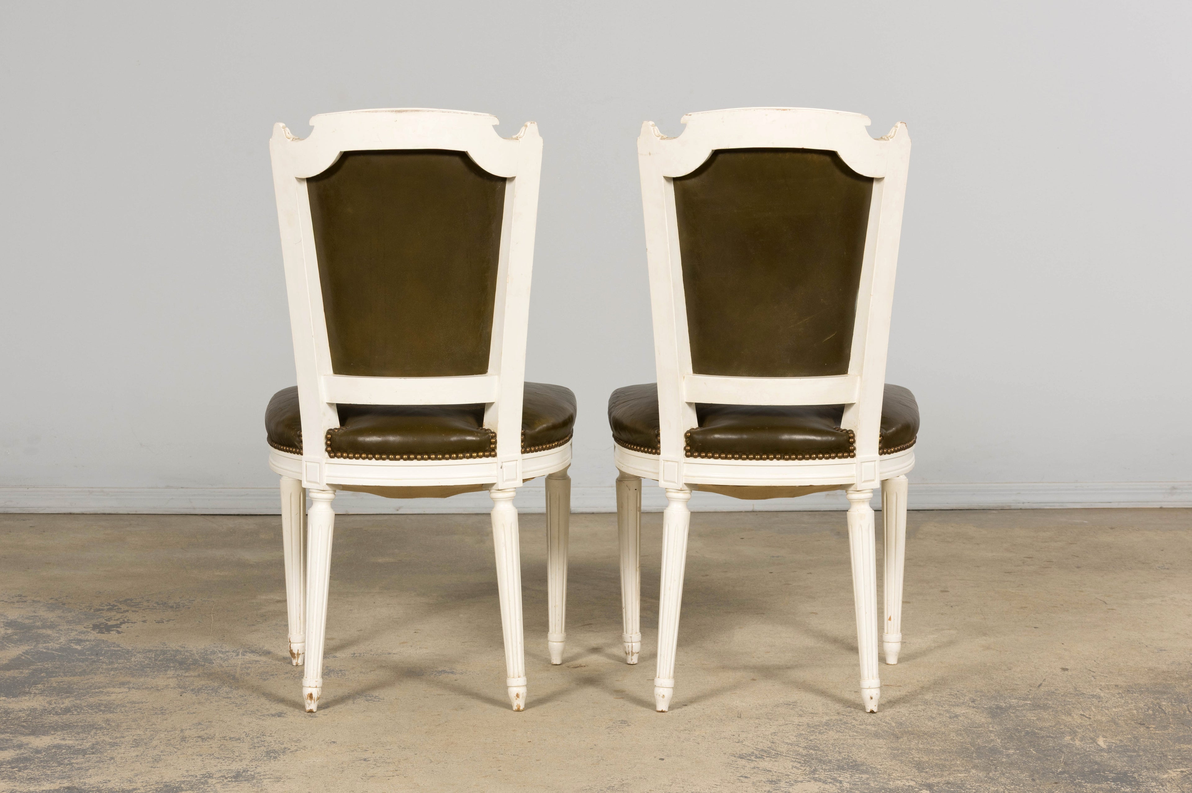 Antique French Louis XVI Style Painted Chairs with Olive Green Leather - A Pair