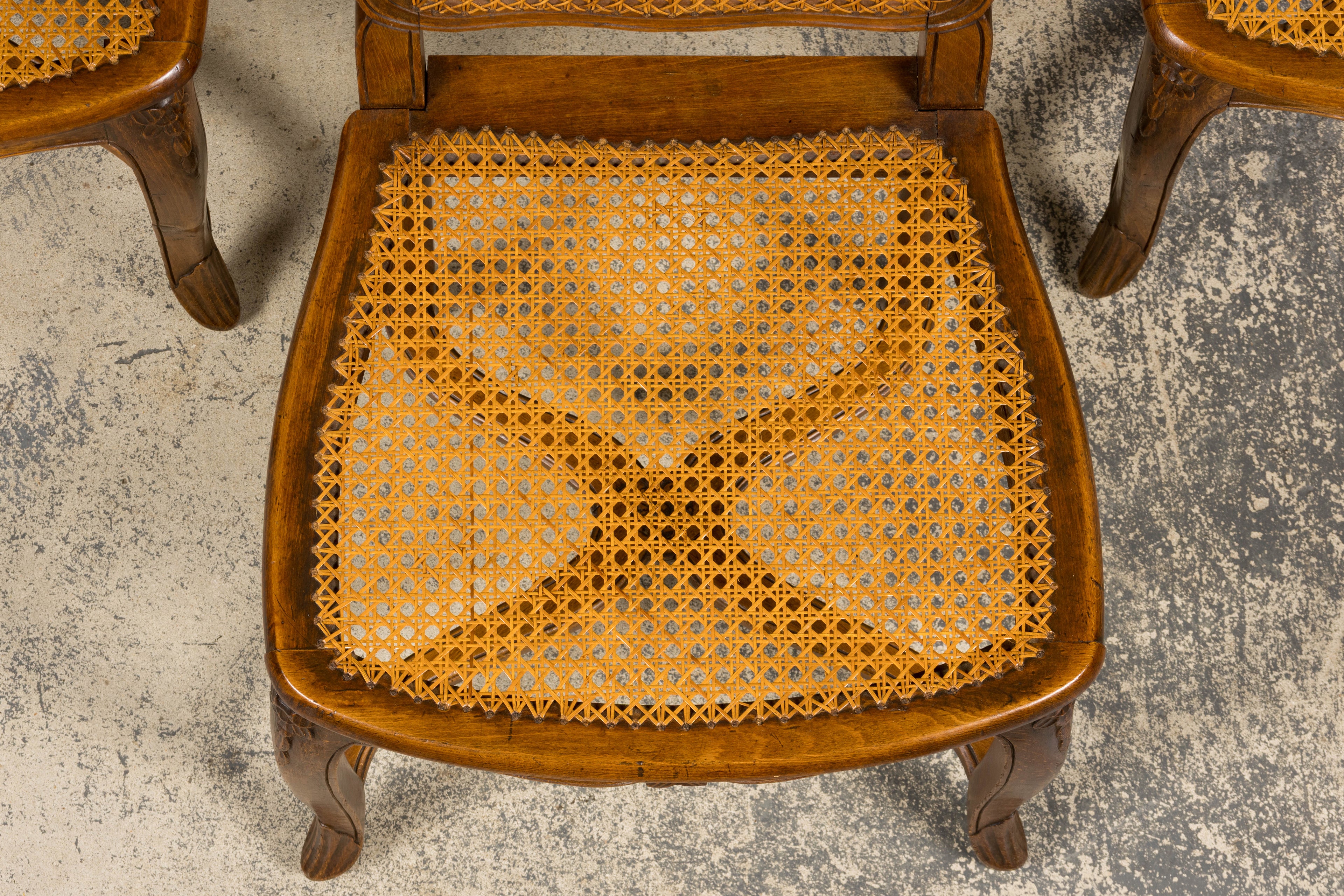 Antique French Louis XV Style Provincial Walnut Cane Dining Chairs, Set of 12