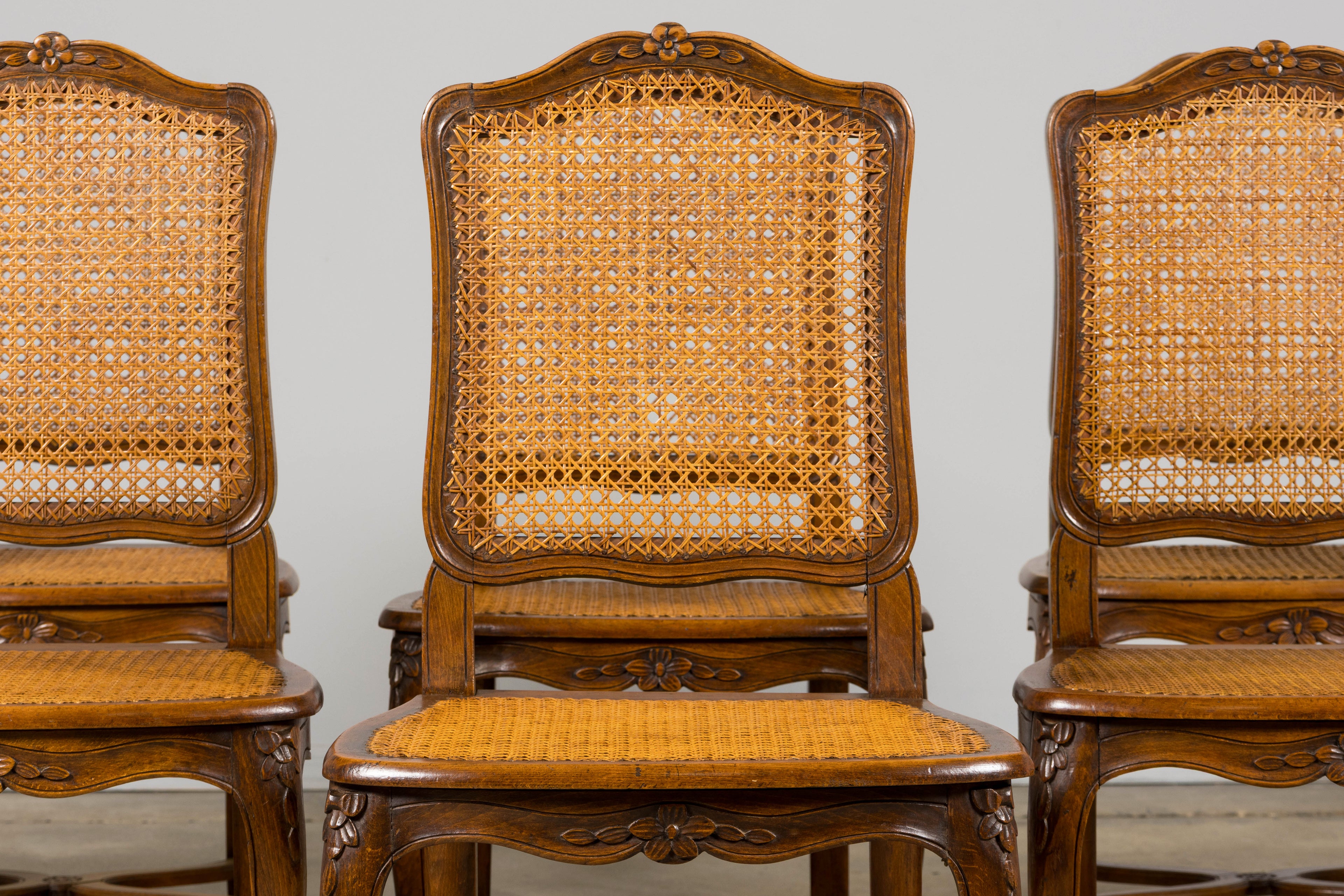 Antique French Louis XV Style Provincial Walnut Cane Dining Chairs, Set of 12
