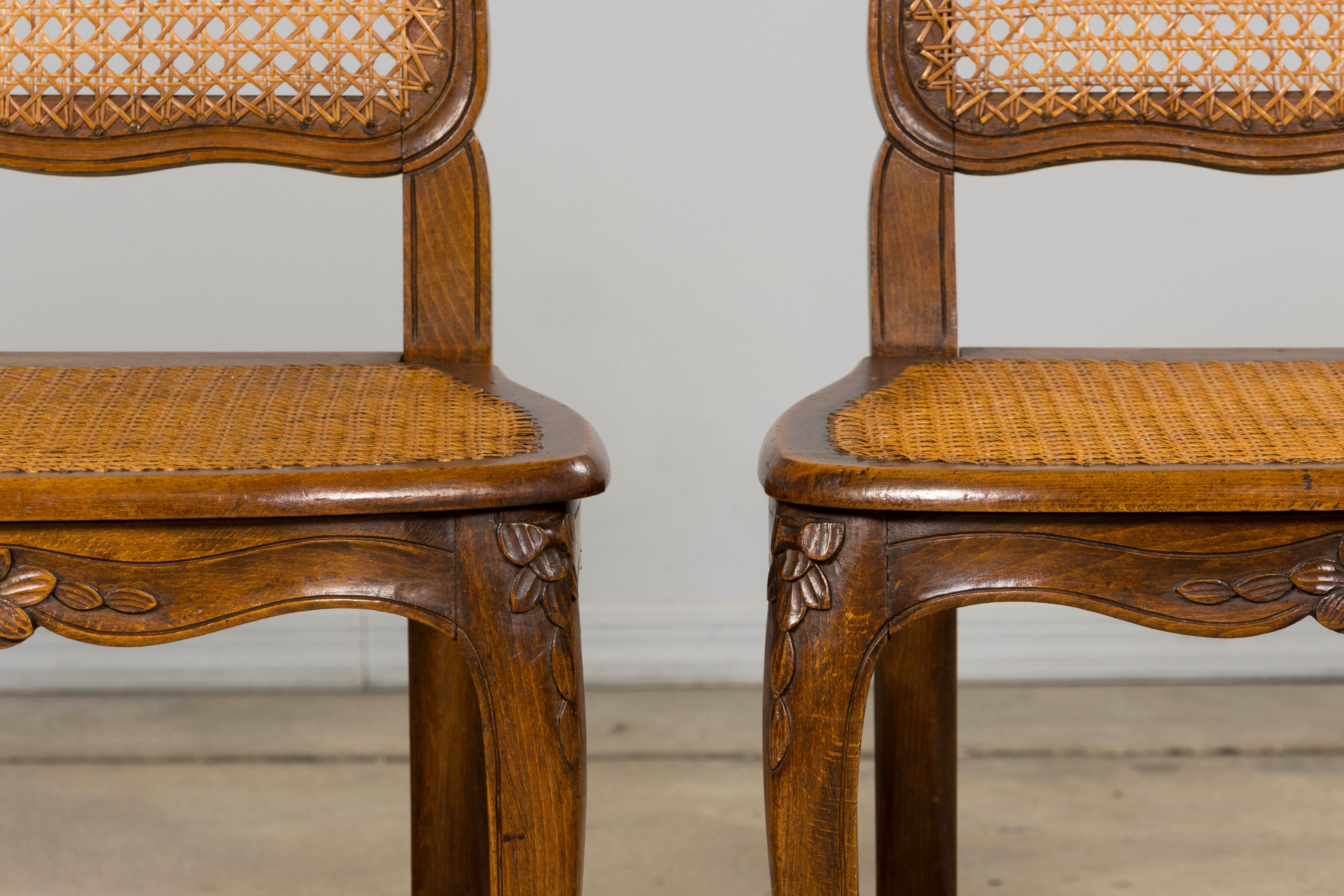 Antique French Louis XV Style Provincial Walnut Cane Dining Chairs, Set of 12