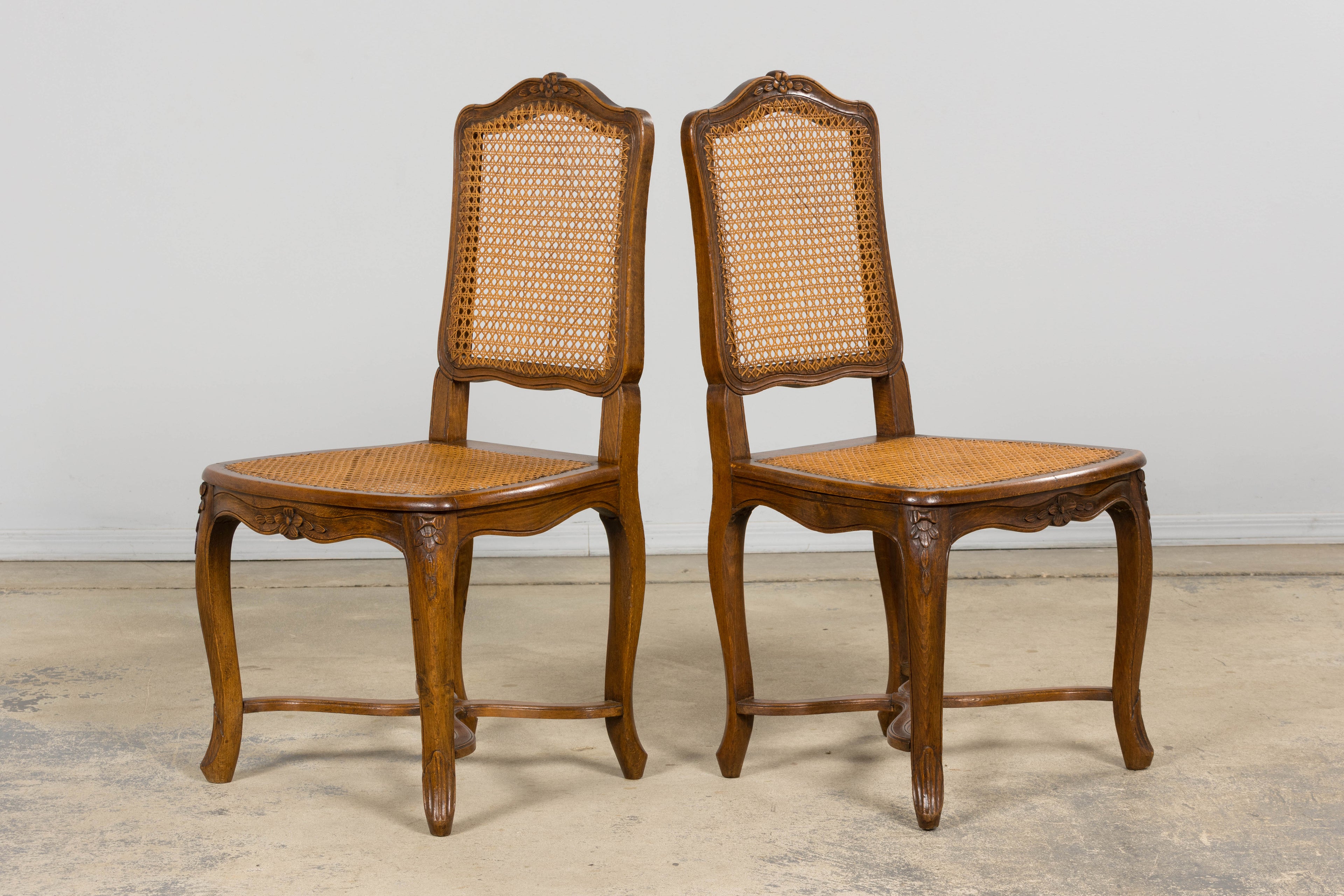 Antique French Louis XV Style Provincial Walnut Cane Dining Chairs, Set of 12