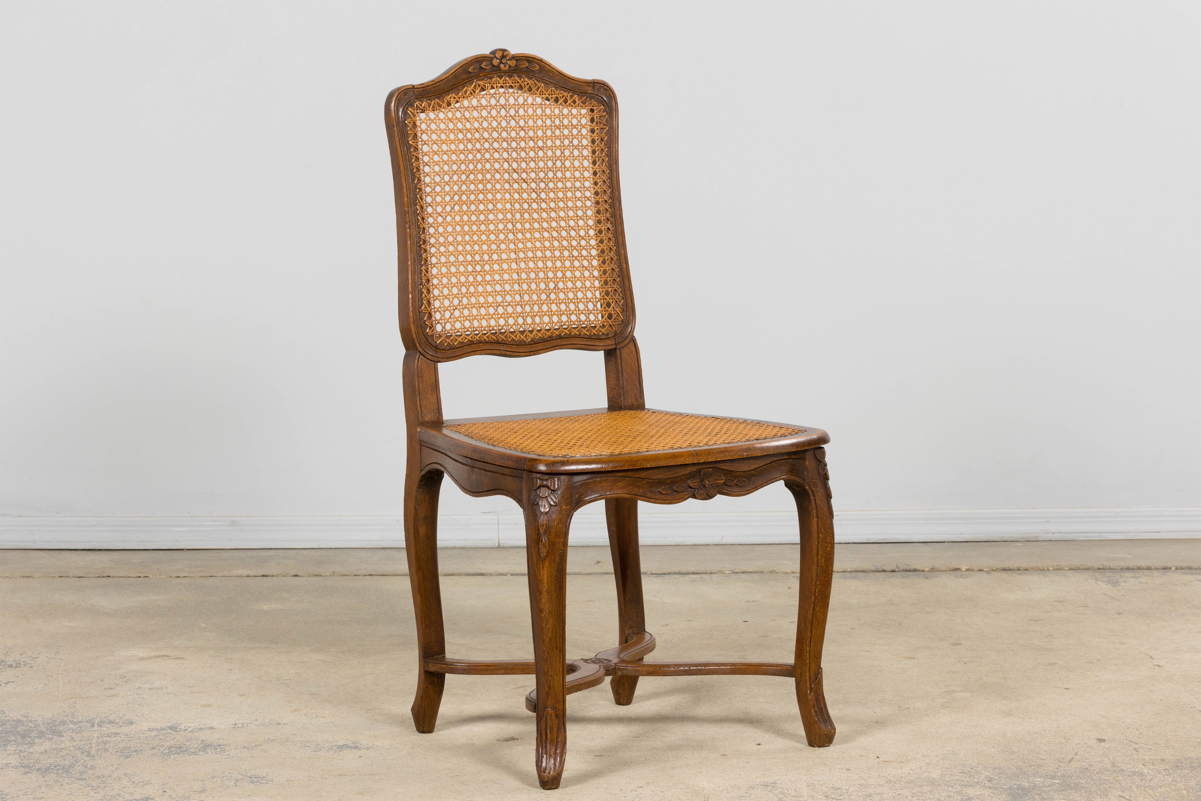 Antique French Louis XV Style Provincial Walnut Cane Dining Chairs, Set of 12