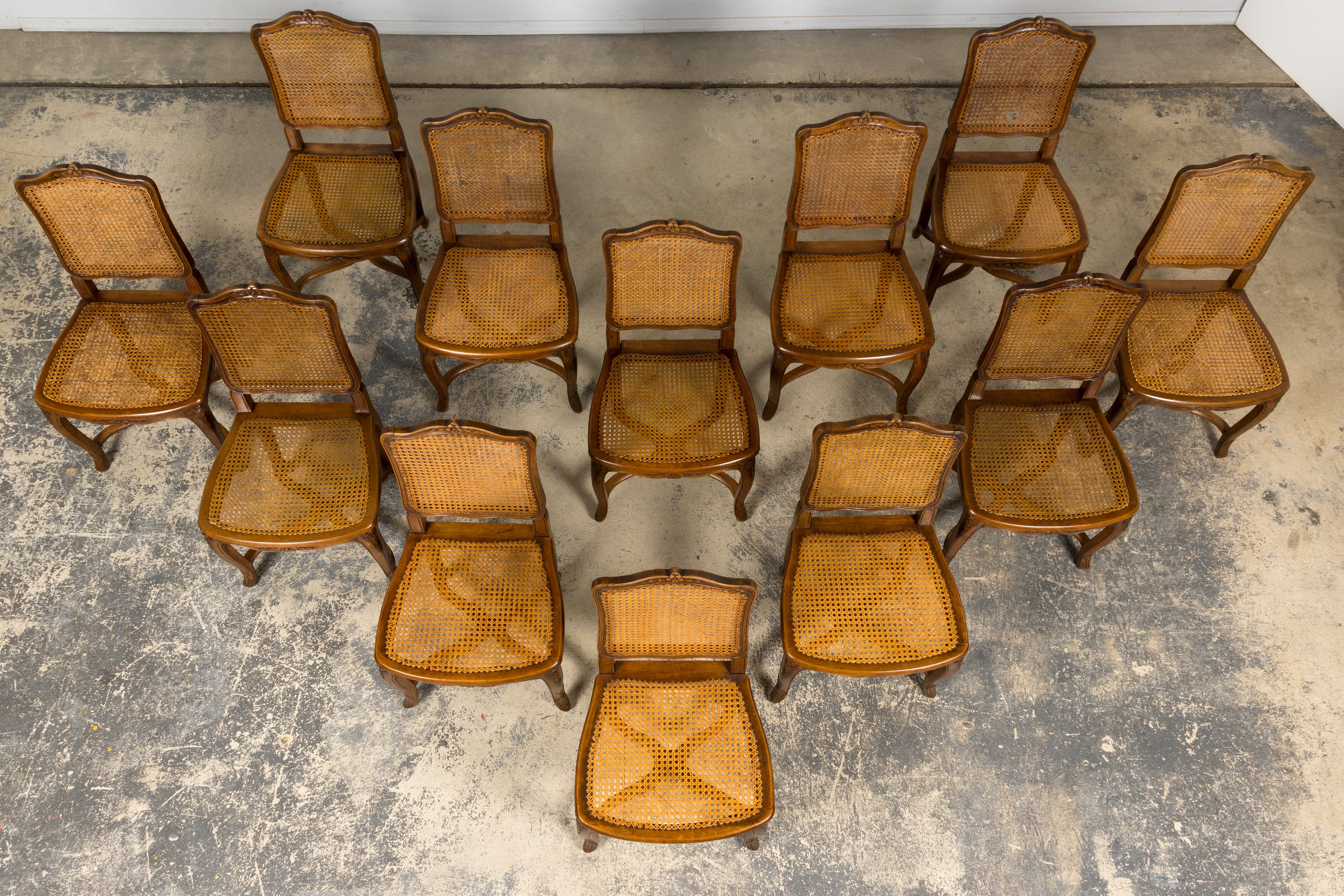 Antique French Louis XV Style Provincial Walnut Cane Dining Chairs, Set of 12