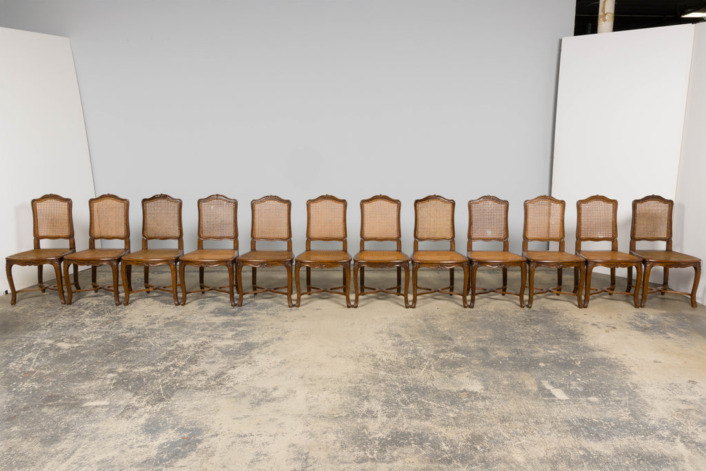 Antique French Louis XV Style Provincial Walnut Cane Dining Chairs, Set of 12