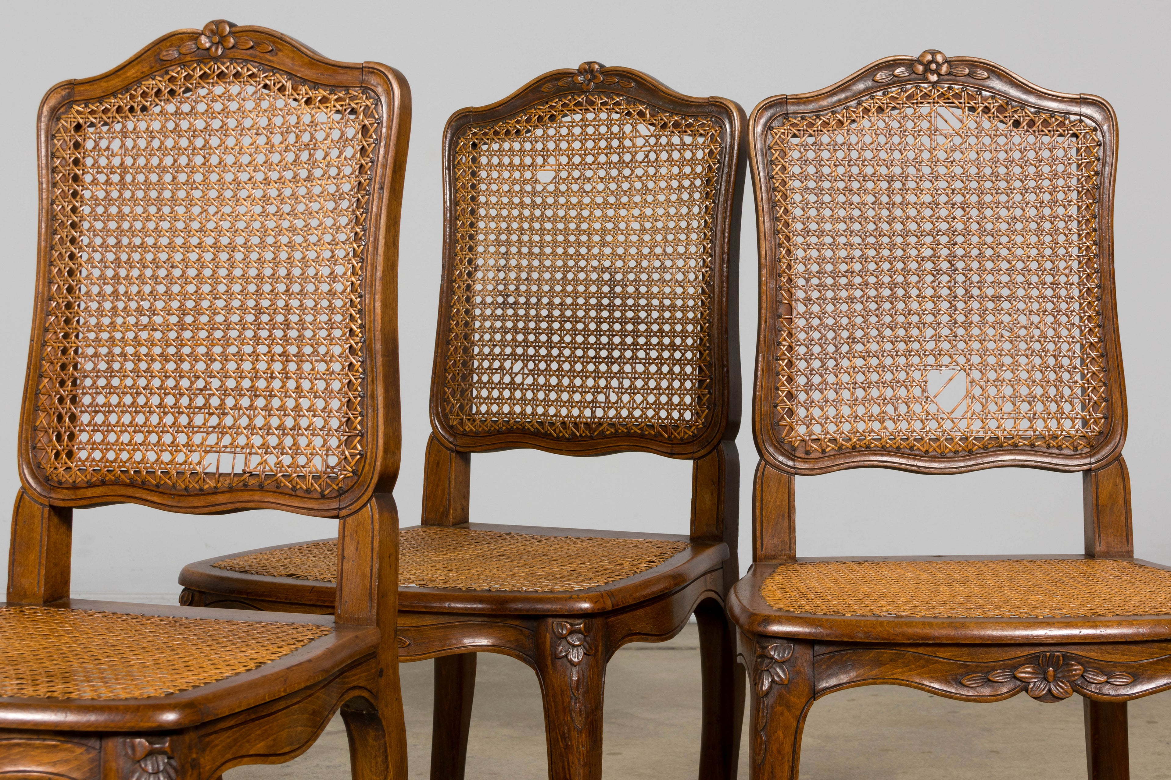 Antique French Louis XV Style Provincial Walnut Cane Dining Chairs, Set of 12