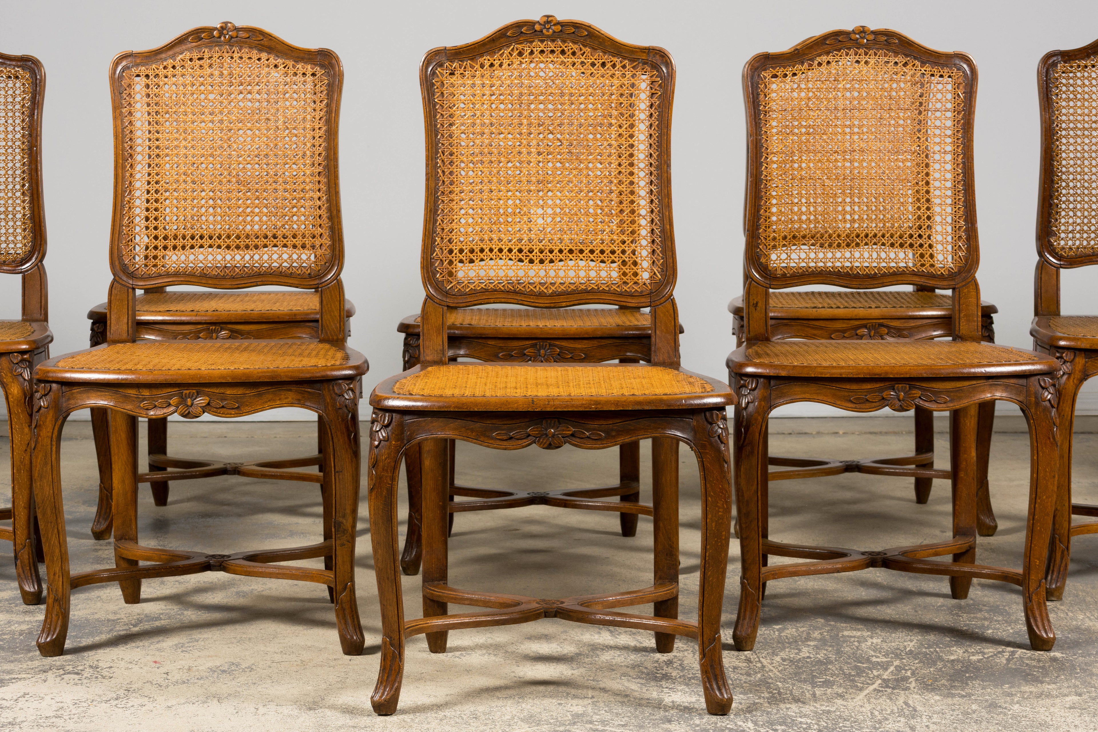 Antique French Louis XV Style Provincial Walnut Cane Dining Chairs, Set of 12