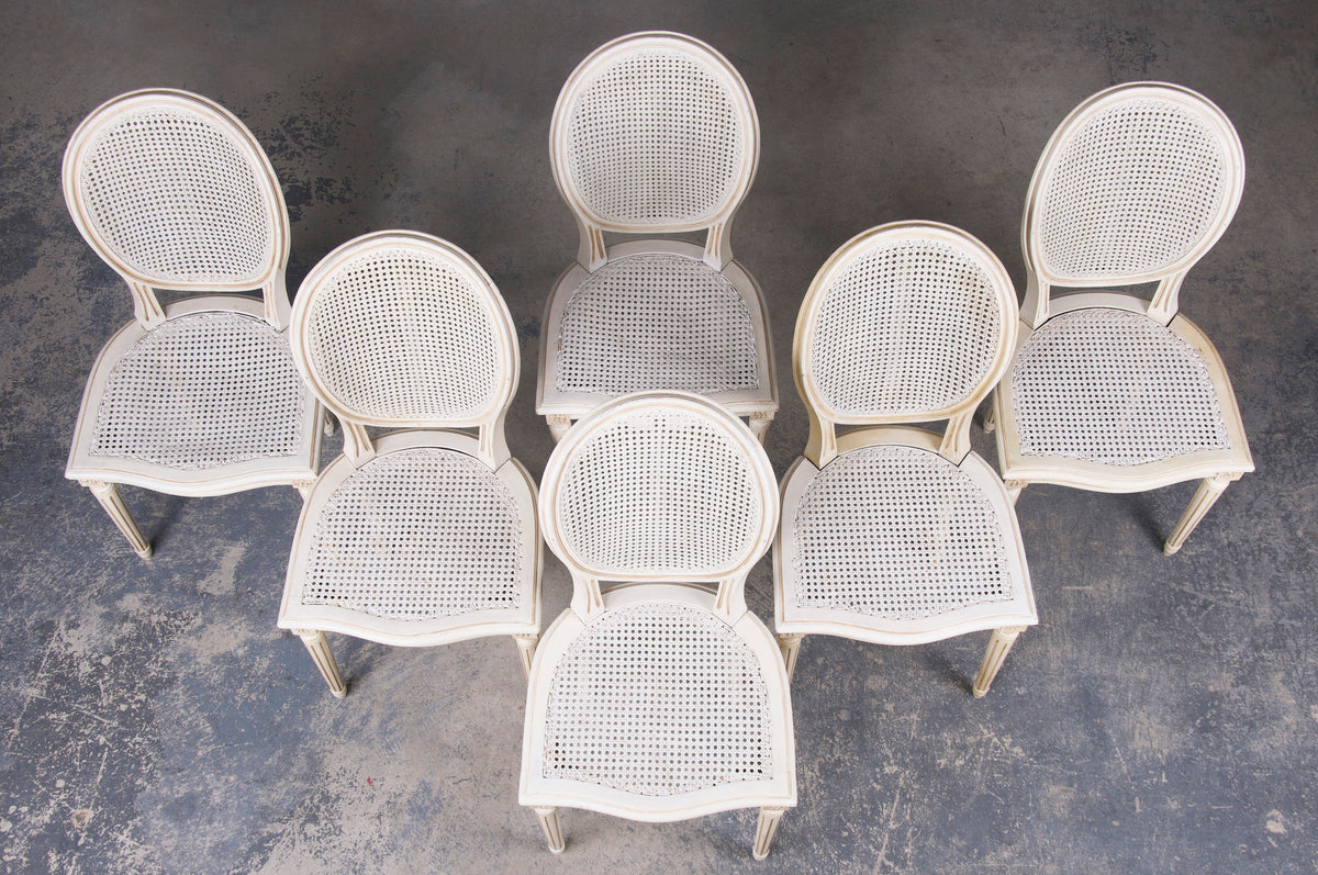 Antique French Louis XVI Style Painted Antique White Cane Dining Chairs - Set of 6