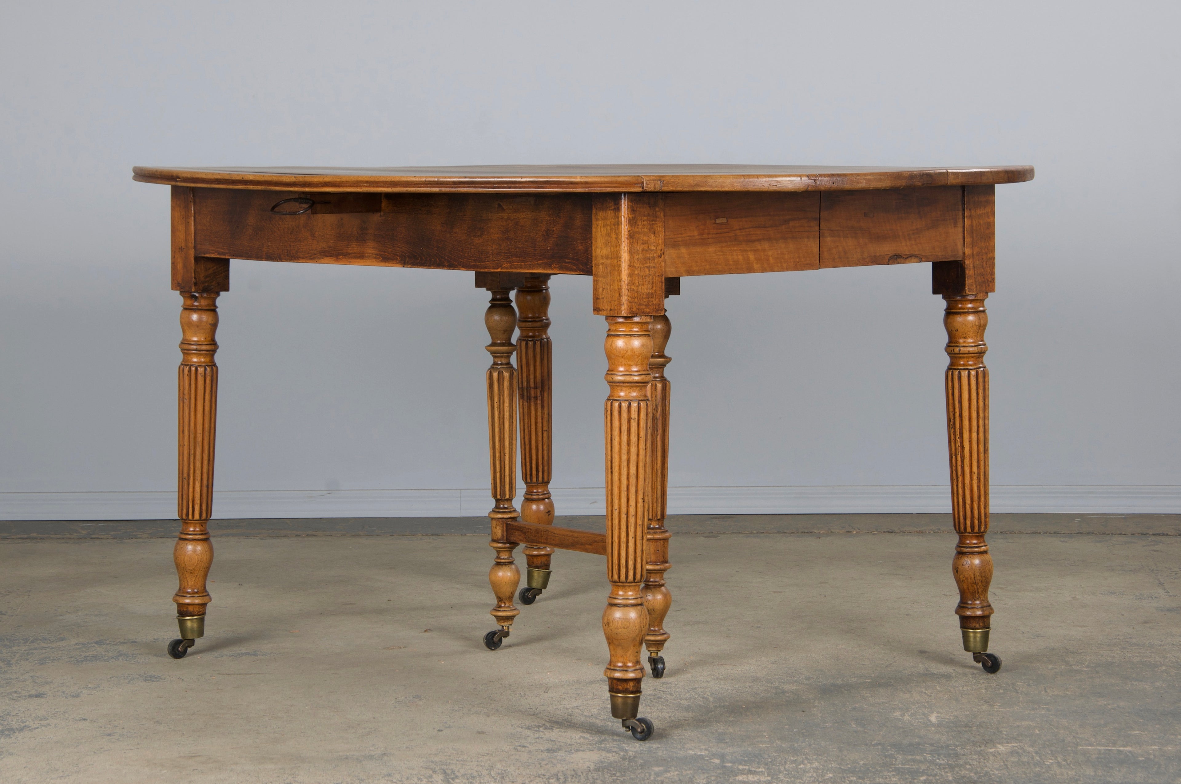 19th Century French Louis Philippe Style Walnut Extendable Drop Leaf Table