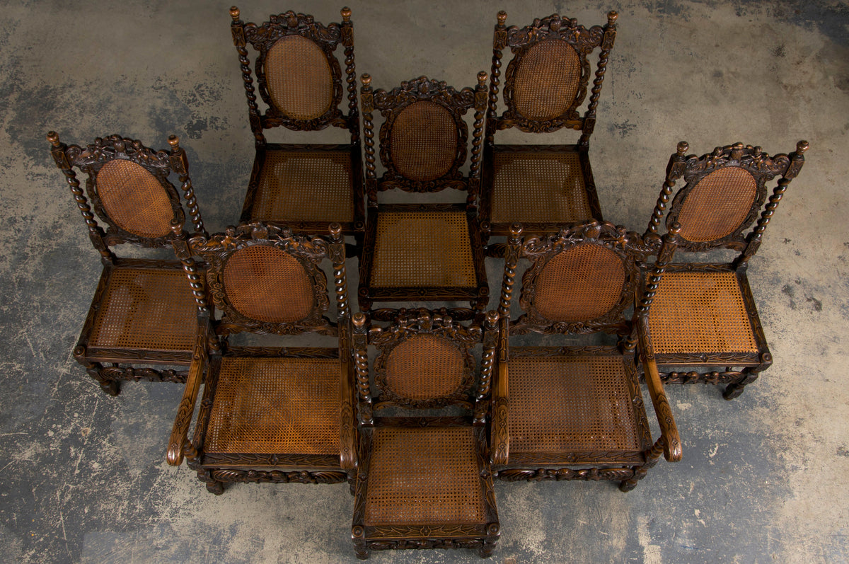 19th Century Jacobean Renaissance Style Walnut and Cane Carved Dining Chairs - Set of 8