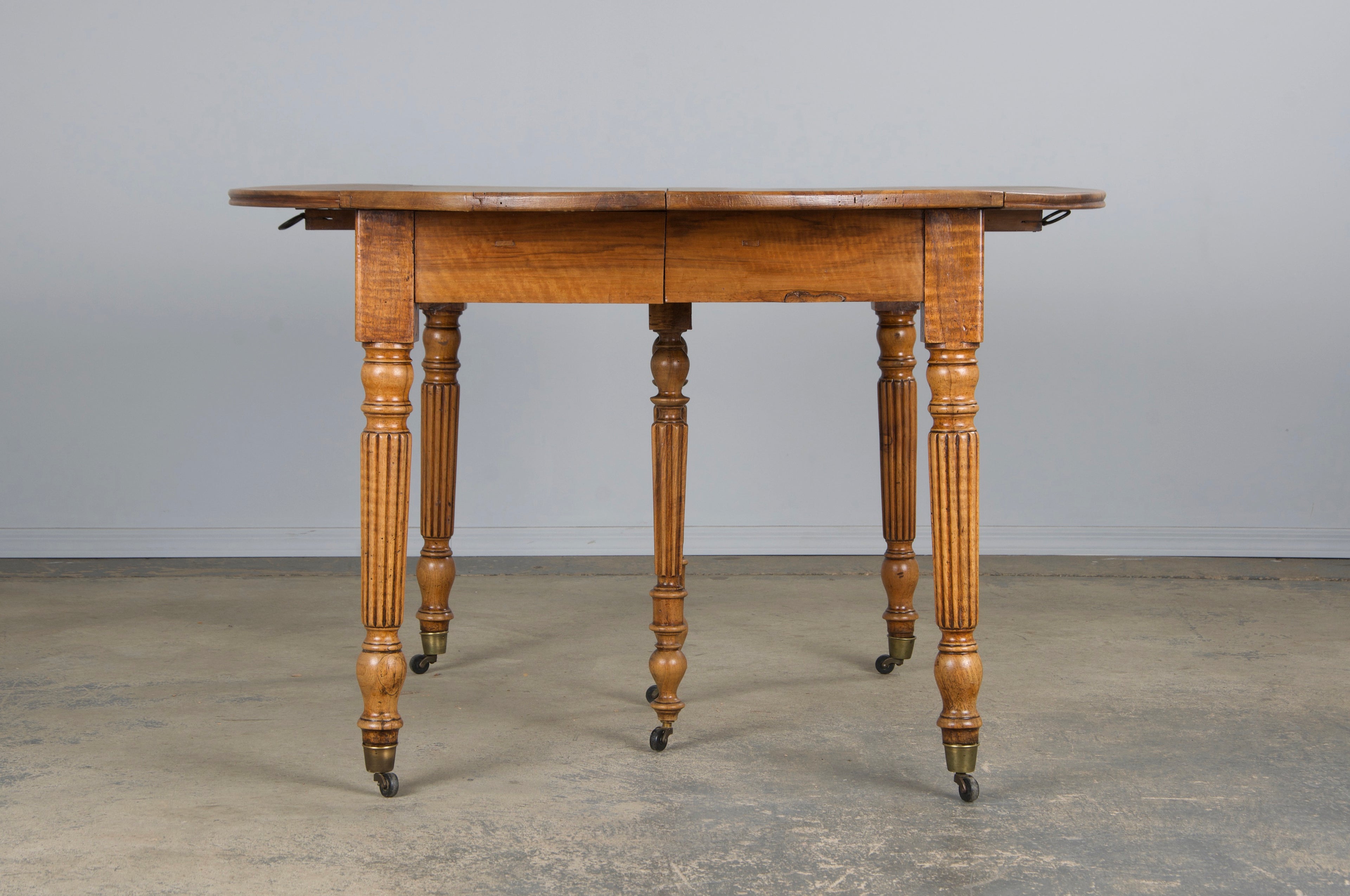 19th Century French Louis Philippe Style Walnut Extendable Drop Leaf Table