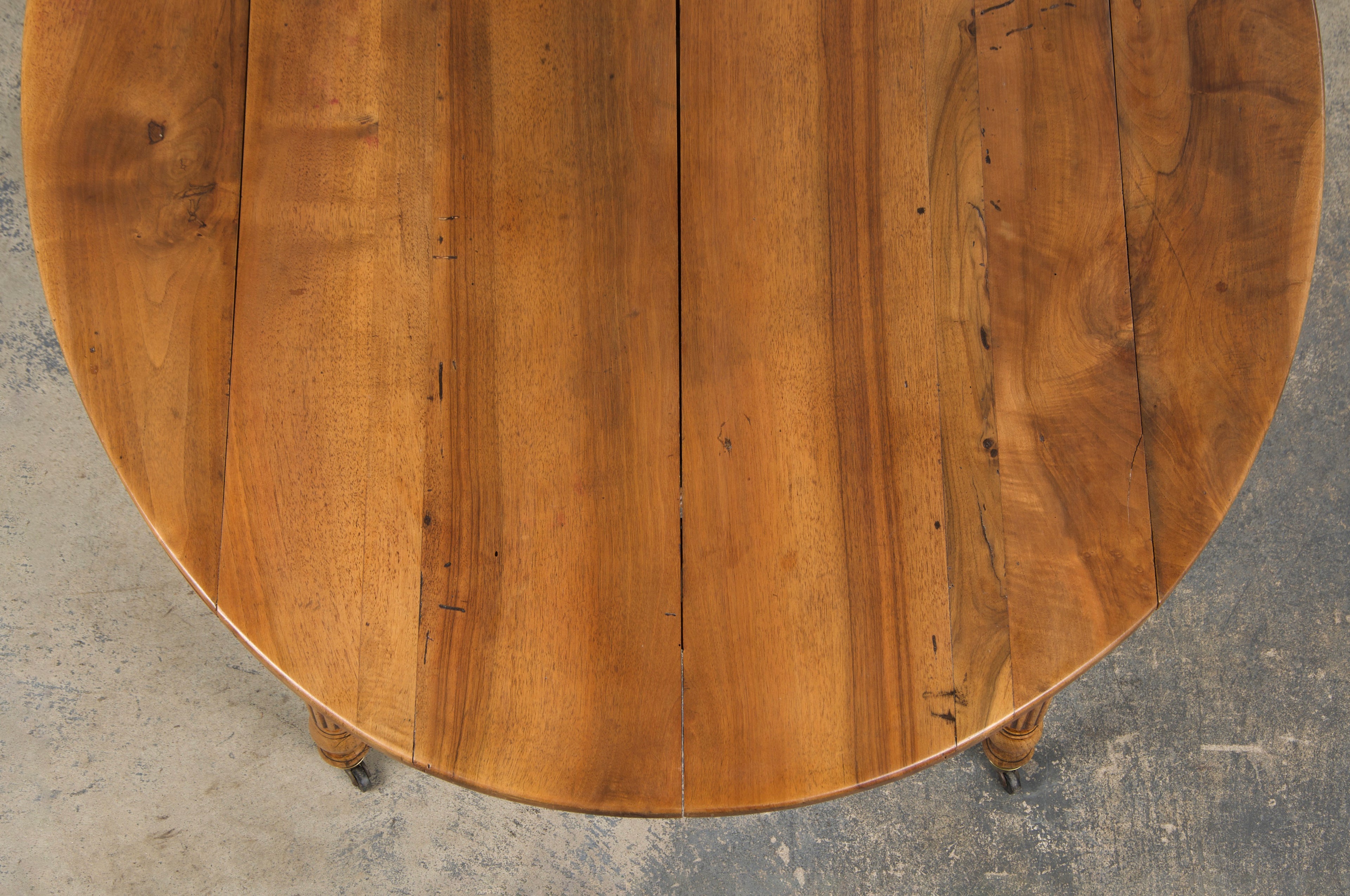 19th Century French Louis Philippe Style Walnut Extendable Drop Leaf Table