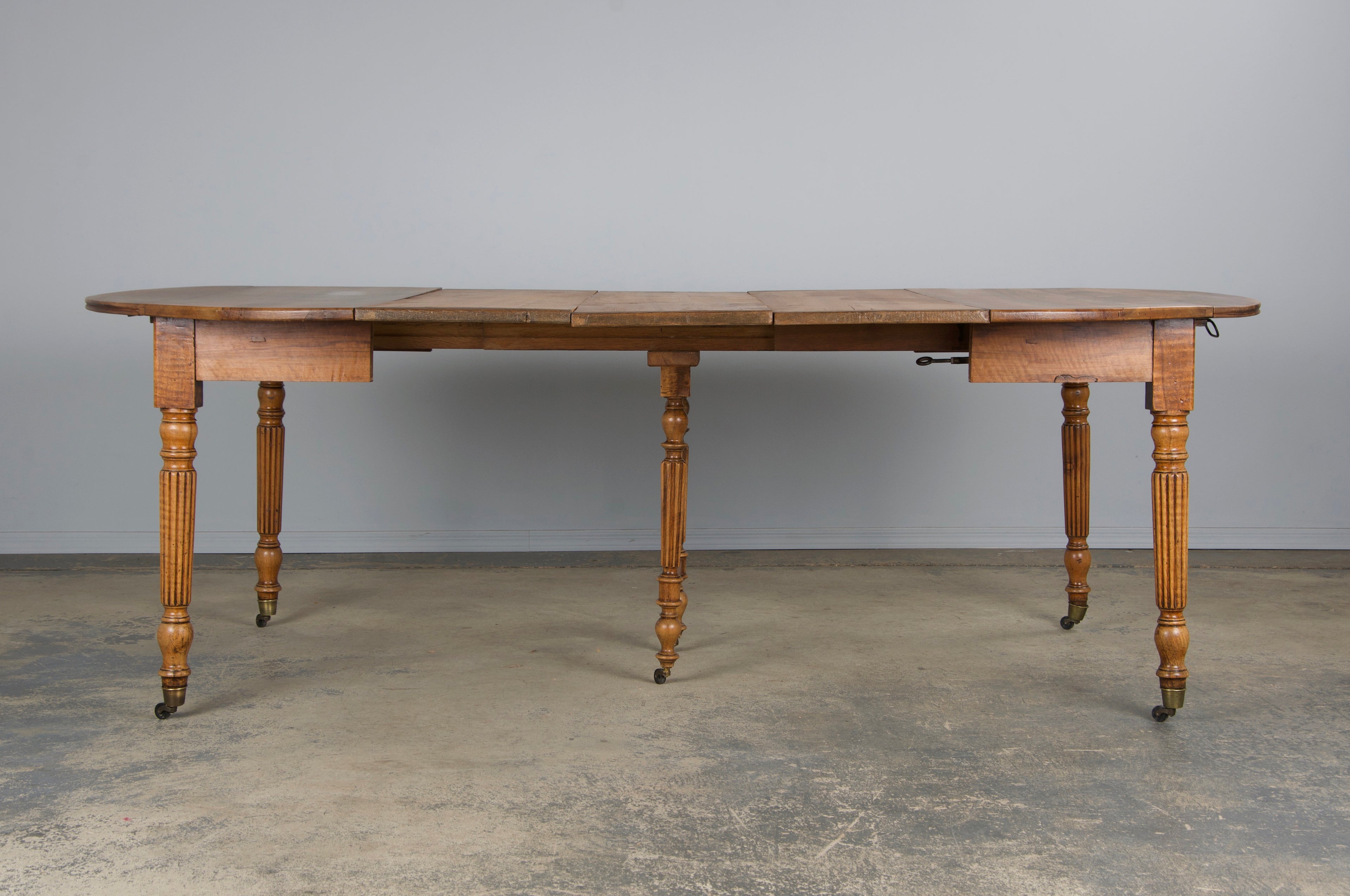 19th Century French Louis Philippe Style Walnut Extendable Drop Leaf Table