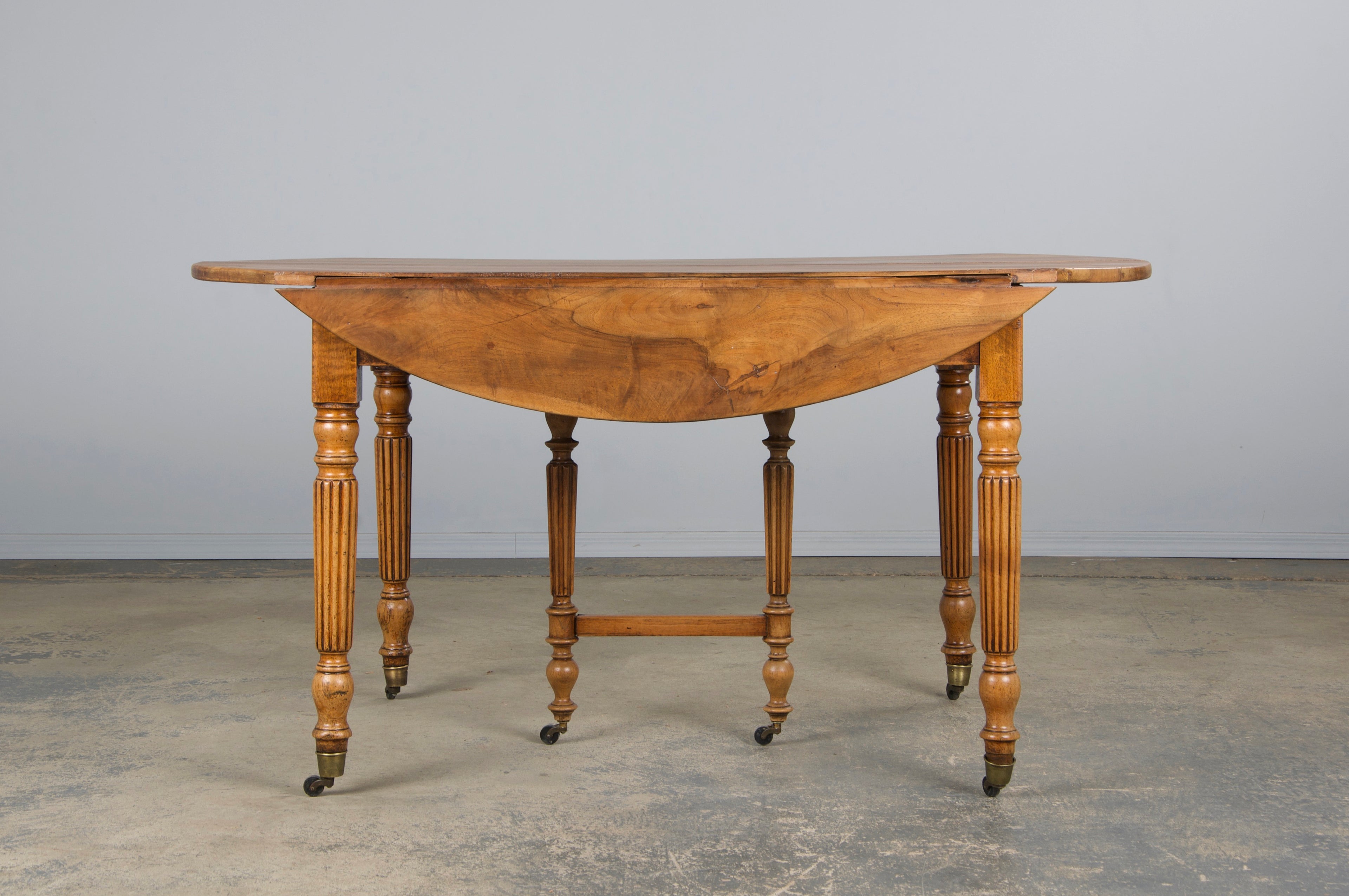 19th Century French Louis Philippe Style Walnut Extendable Drop Leaf Table