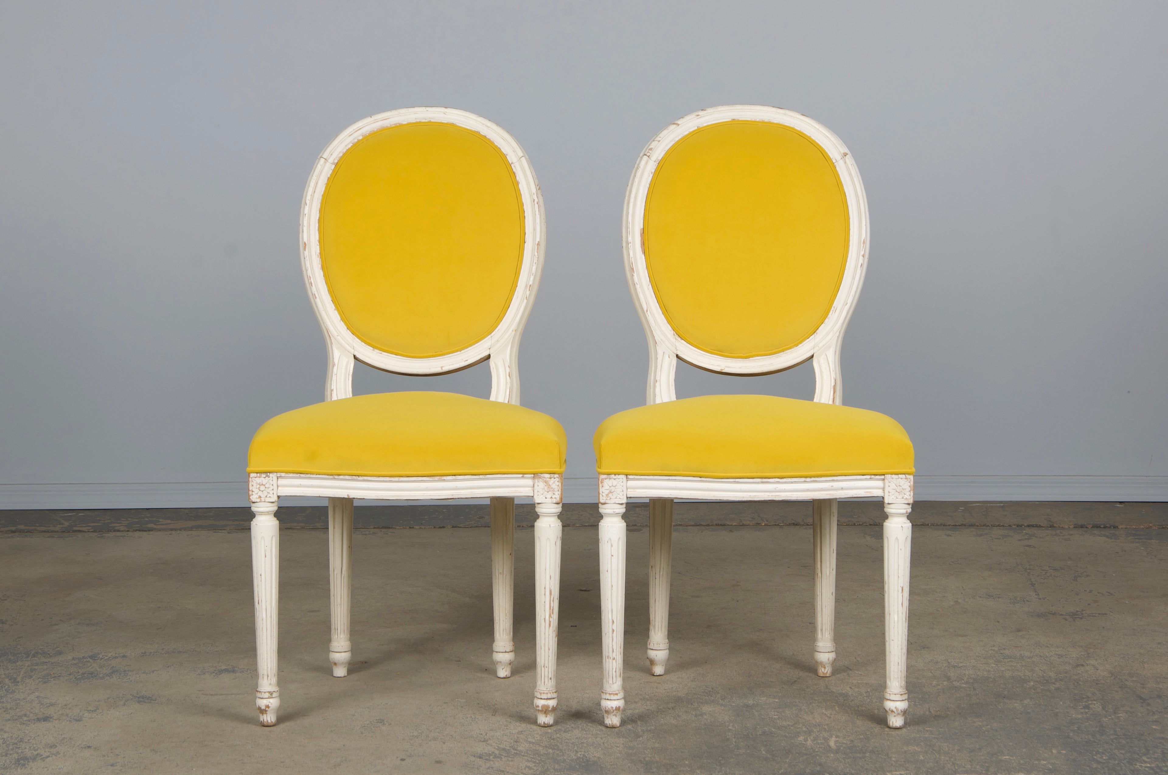 French Louis XVI Style Painted Side Chairs in Lemon Velvet - A Pair