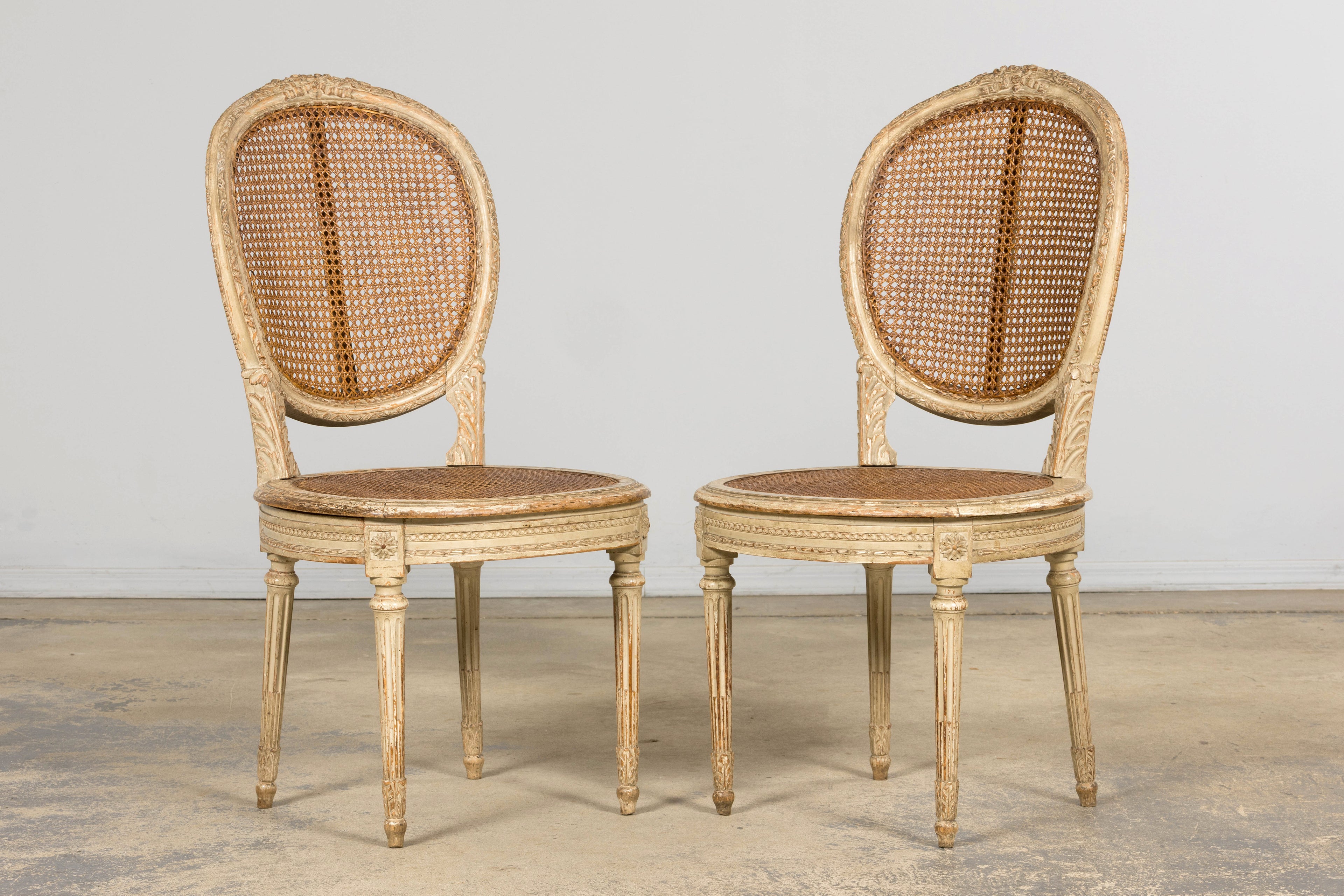 Early 19th Century French Louis XVI Painted Cane Dining Chairs - Set of 10