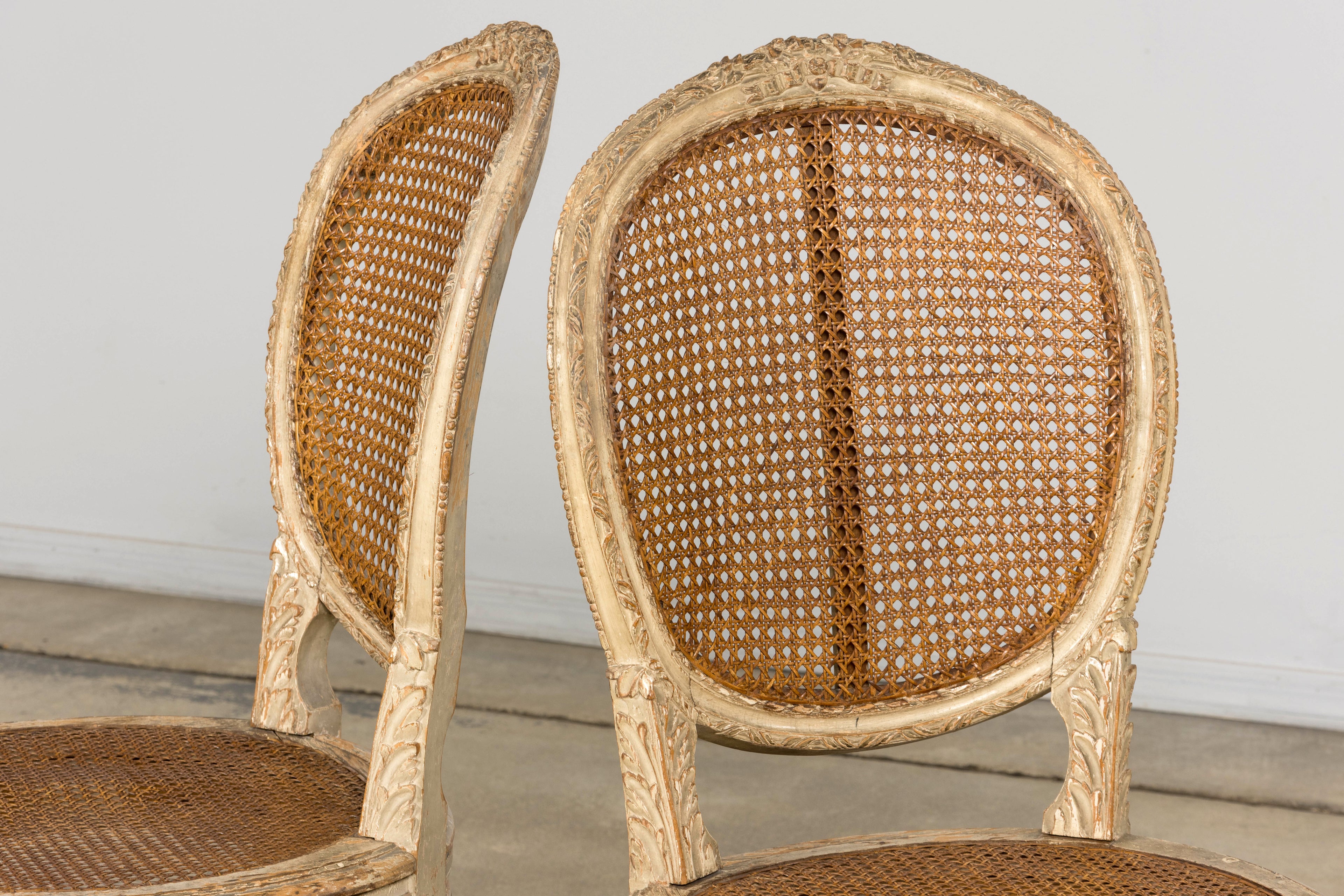 Early 19th Century French Louis XVI Painted Cane Dining Chairs - Set of 10