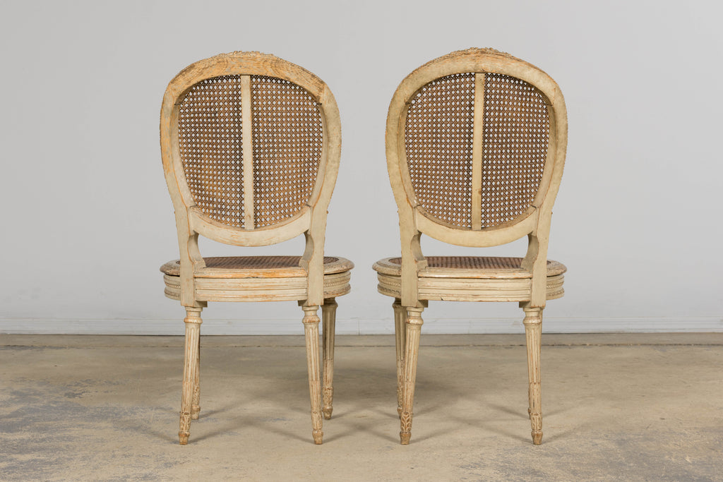 Early 19th Century French Louis XVI Painted Cane Dining Chairs - Set of 10