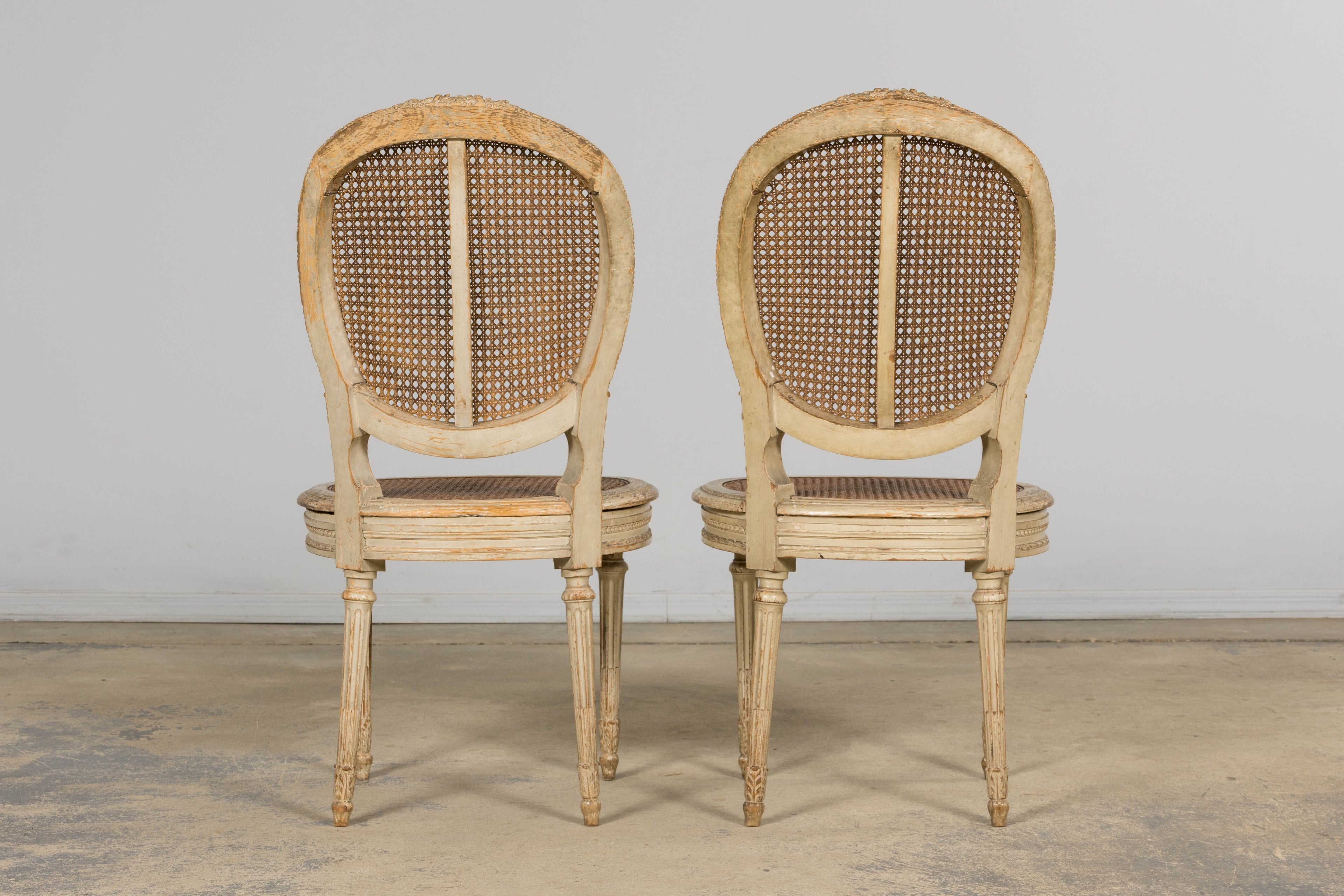 Early 19th Century French Louis XVI Painted Cane Dining Chairs - Set of 10