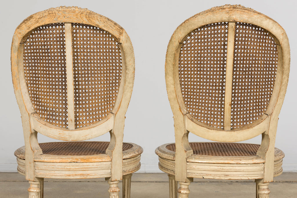 Early 19th Century French Louis XVI Painted Cane Dining Chairs - Set of 10