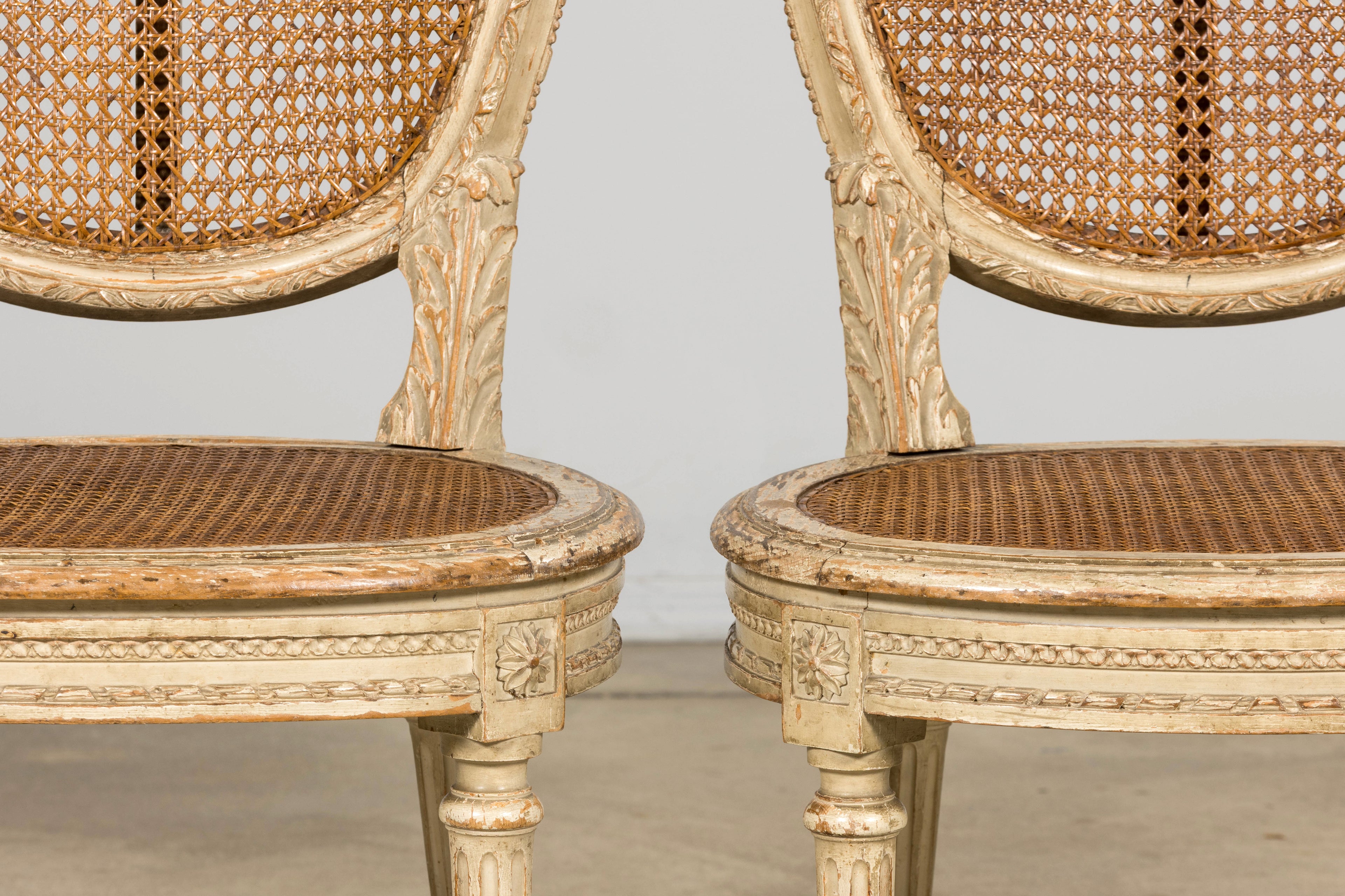 Early 19th Century French Louis XVI Painted Cane Dining Chairs - Set of 10
