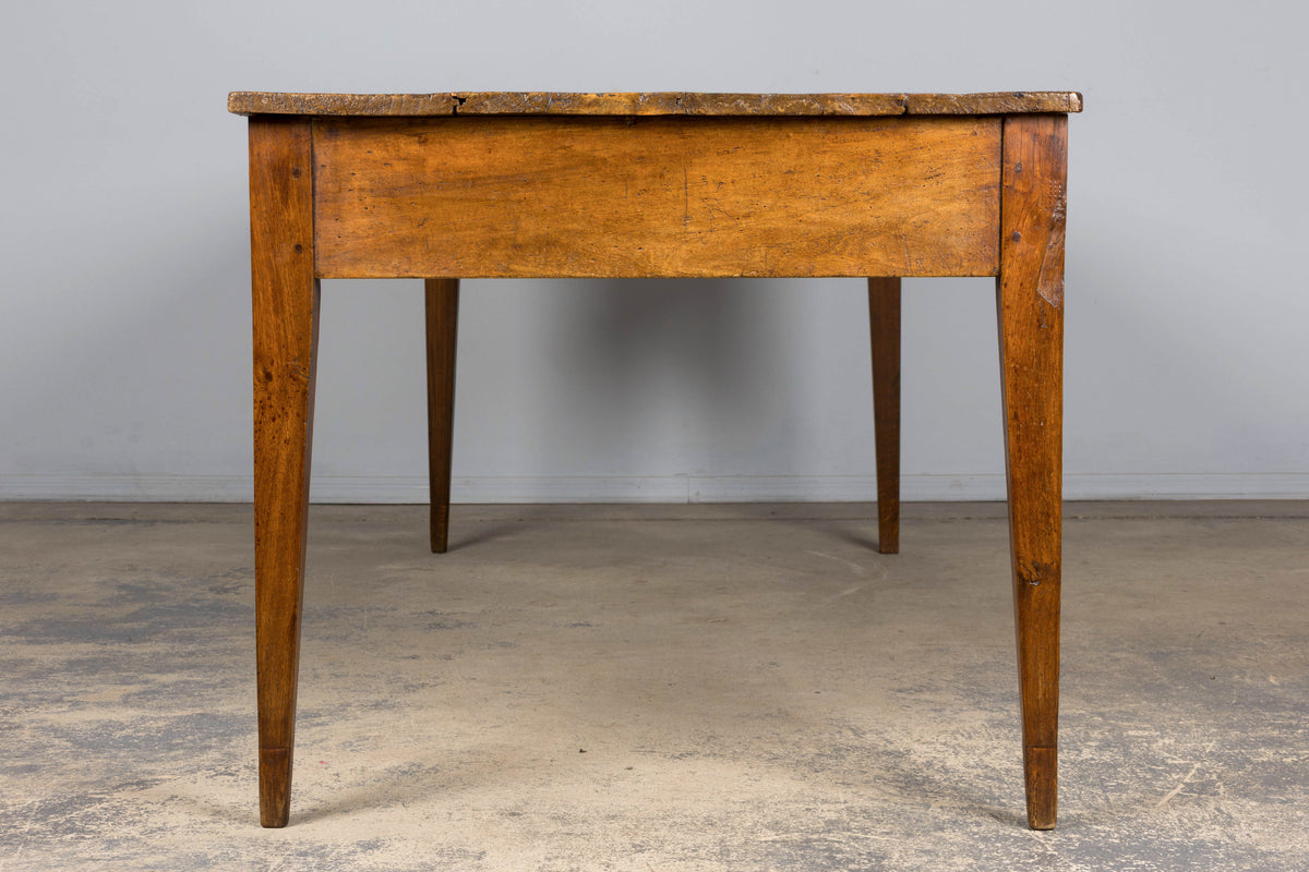 Early 19th Century French Provincial Fruitwood Farmhouse Table with Two Drawers