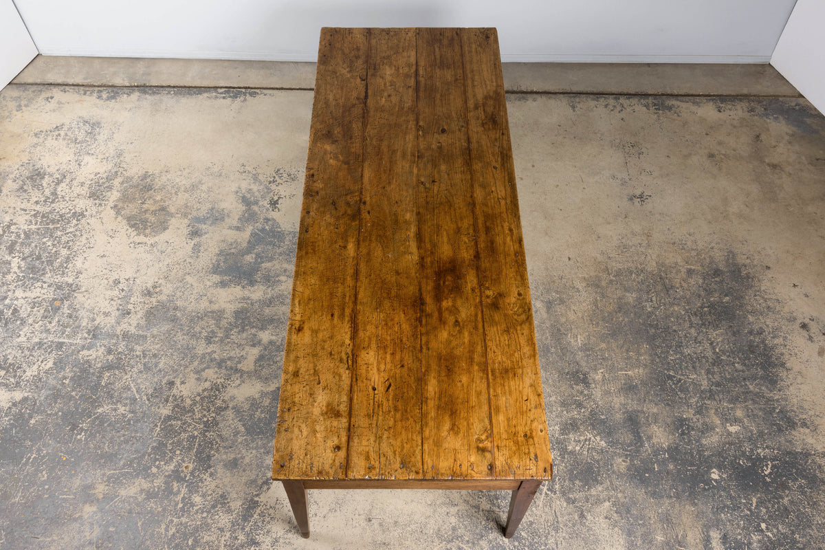 Early 19th Century French Provincial Fruitwood Farmhouse Table with Two Drawers