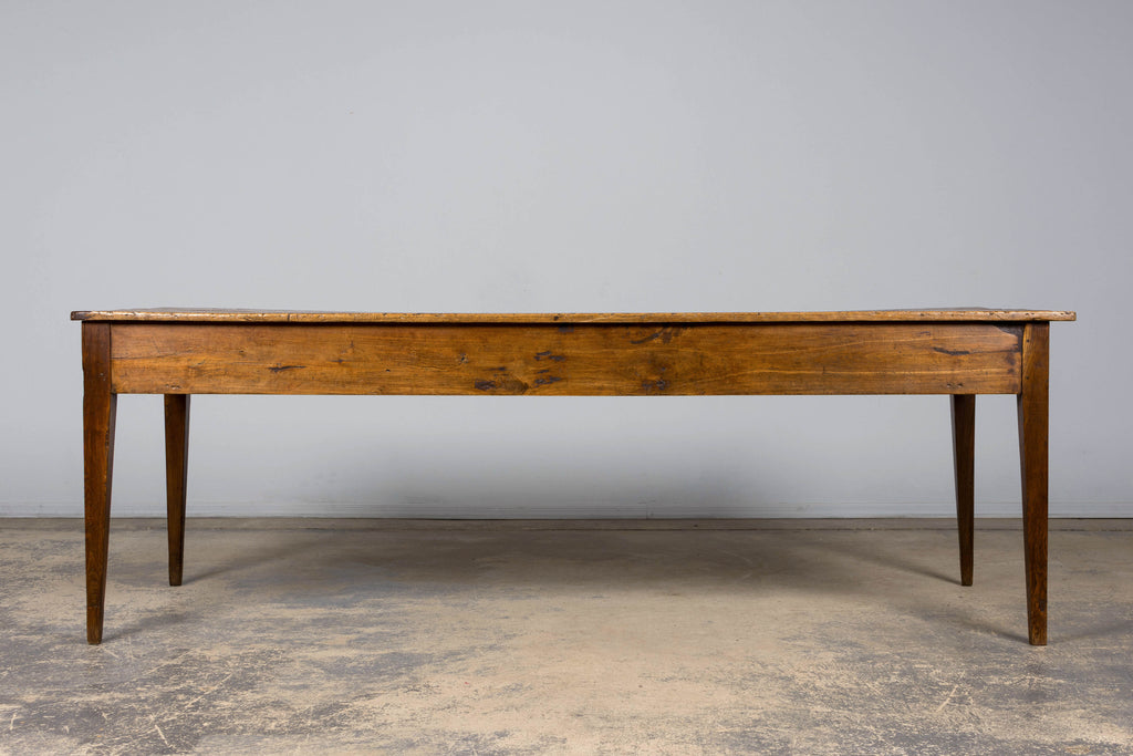 Early 19th Century French Provincial Fruitwood Farmhouse Table with Two Drawers