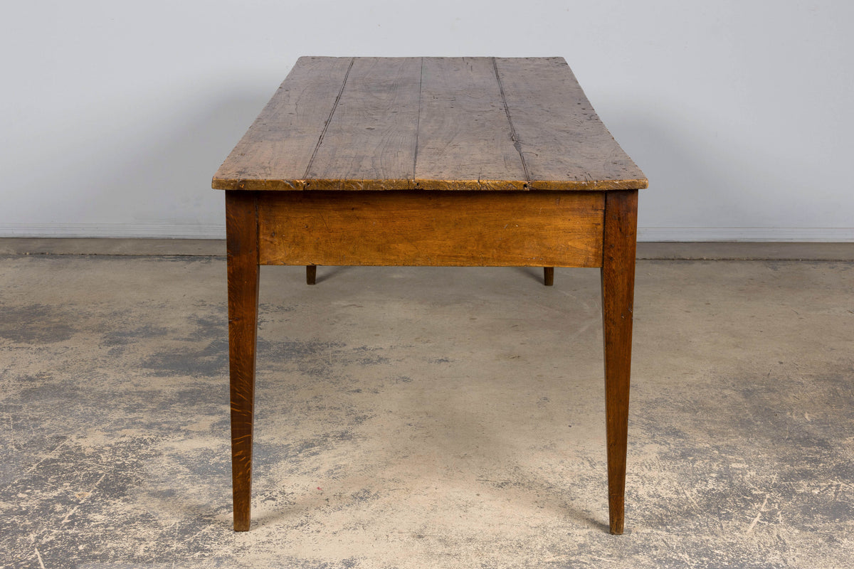 Early 19th Century French Provincial Fruitwood Farmhouse Table with Two Drawers