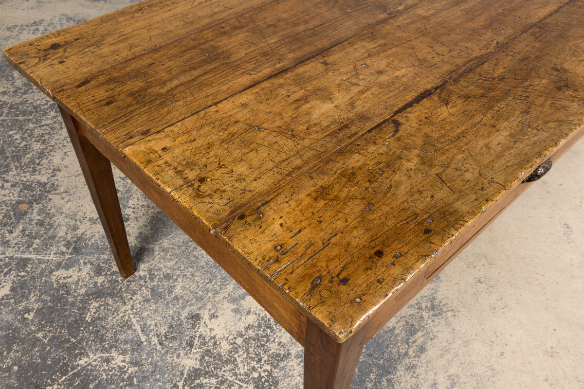 Early 19th Century French Provincial Fruitwood Farmhouse Table with Two Drawers