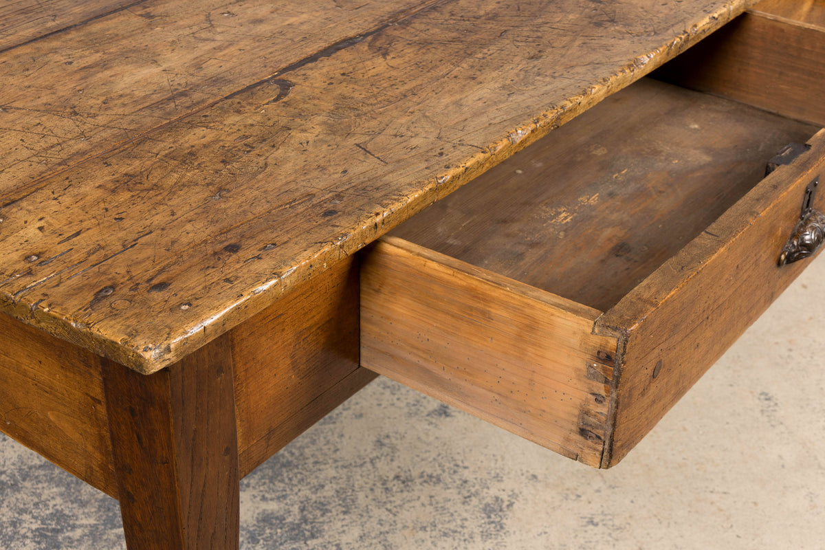 Early 19th Century French Provincial Fruitwood Farmhouse Table with Two Drawers