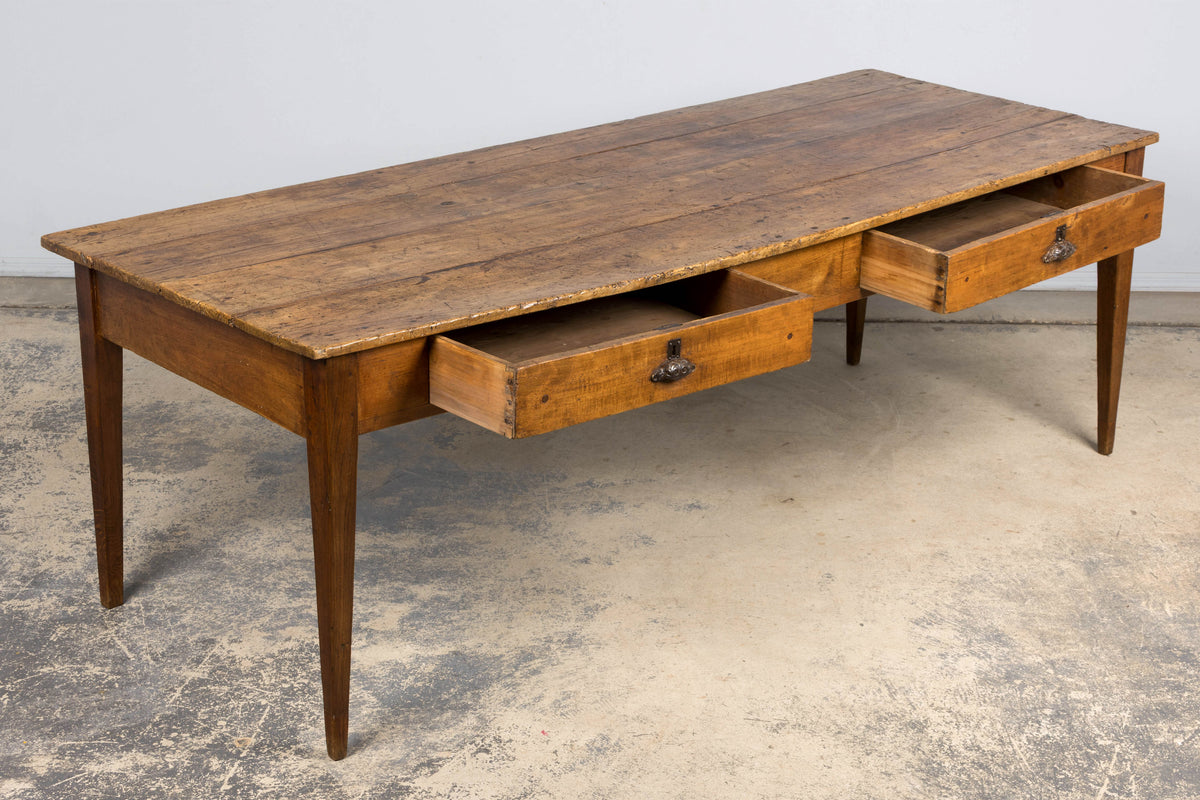 Early 19th Century French Provincial Fruitwood Farmhouse Table with Two Drawers
